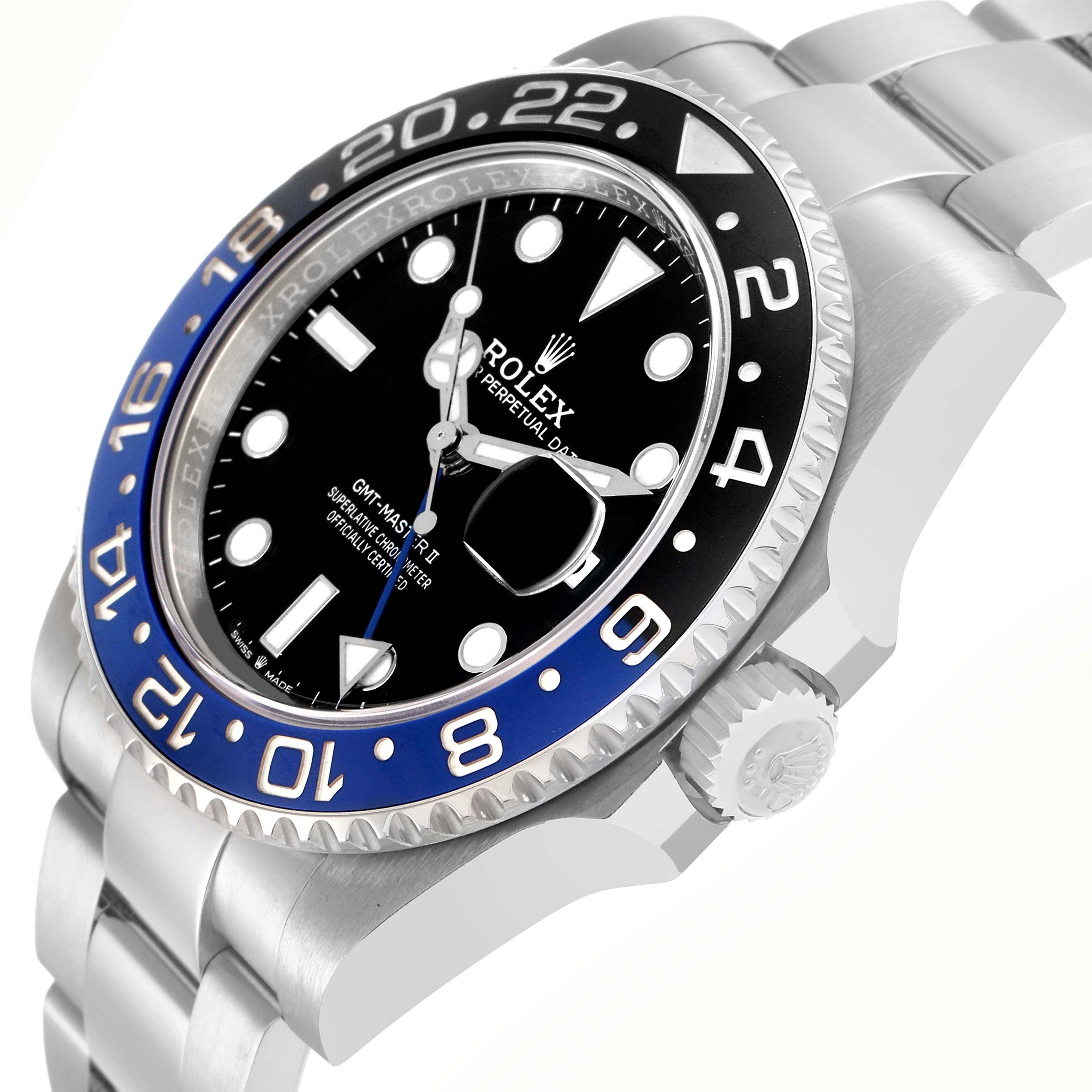 The Rolex GMT-Master model number 126710 is shown at a side angle, displaying the bezel, crown, bracelet, and dial with its distinctive markings.