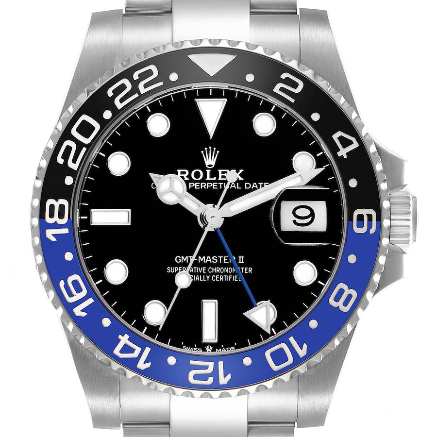 The Rolex GMT-Master II model 126710 is shown from a front angle, highlighting the bezel, dial, hands, and date window.