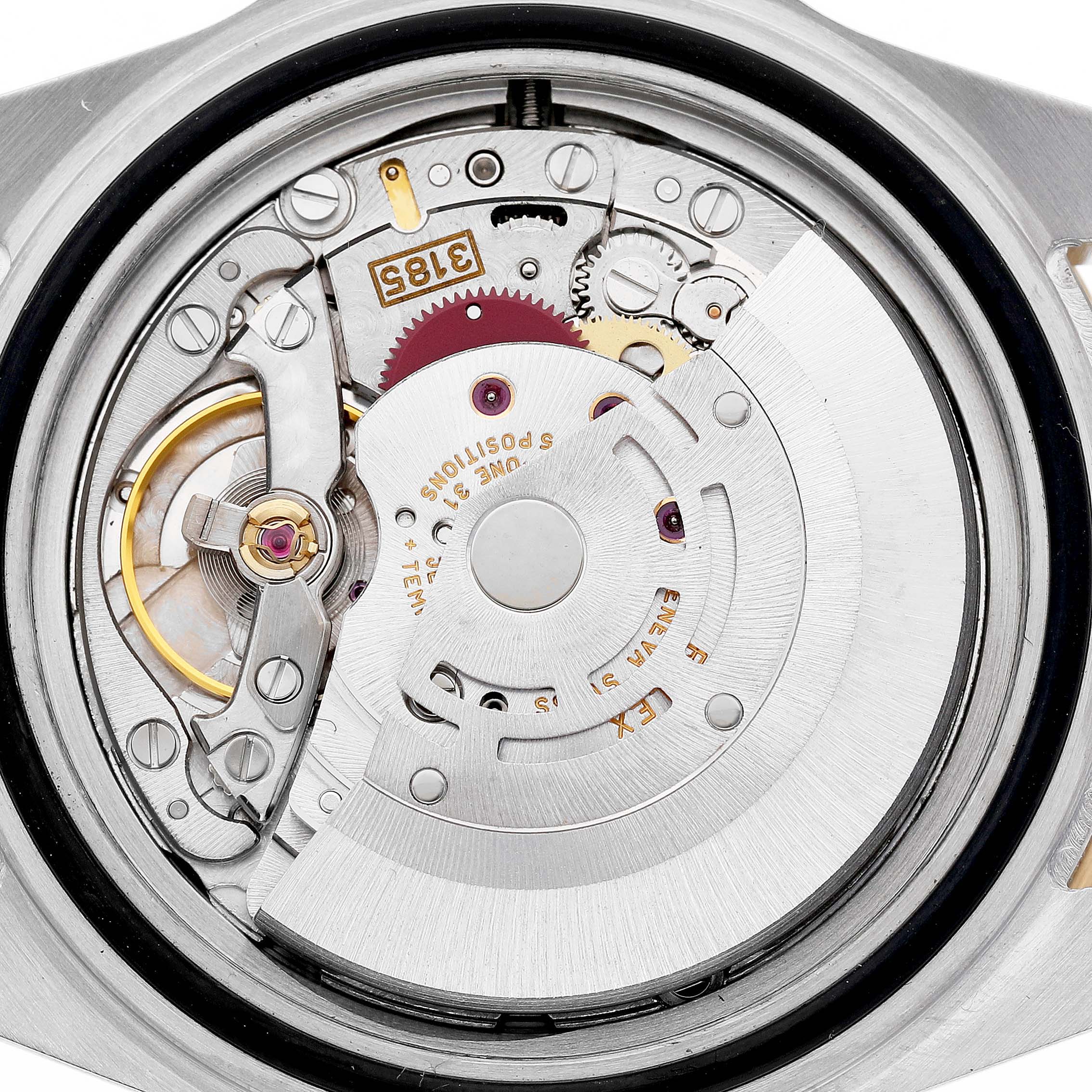 The image shows the movement of the Rolex GMT-Master 16713 Men's Stainless Steel Brown Dial, featuring gears and the oscillating weight from a back view.