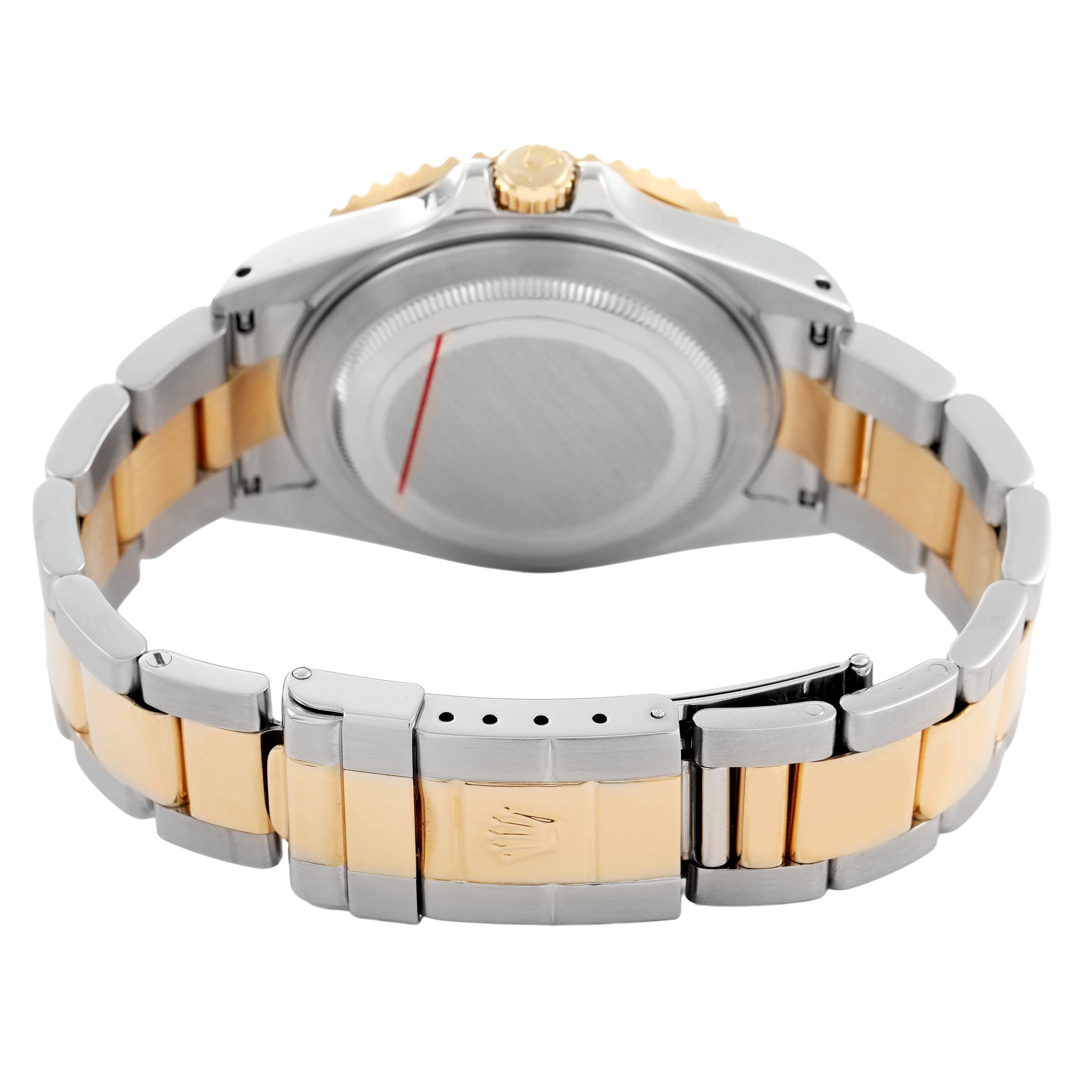 The image shows the back of a Rolex GMT-Master 16713 Men's Stainless Steel Brown Dial watch, highlighting the case back and two-tone bracelet with clasp.