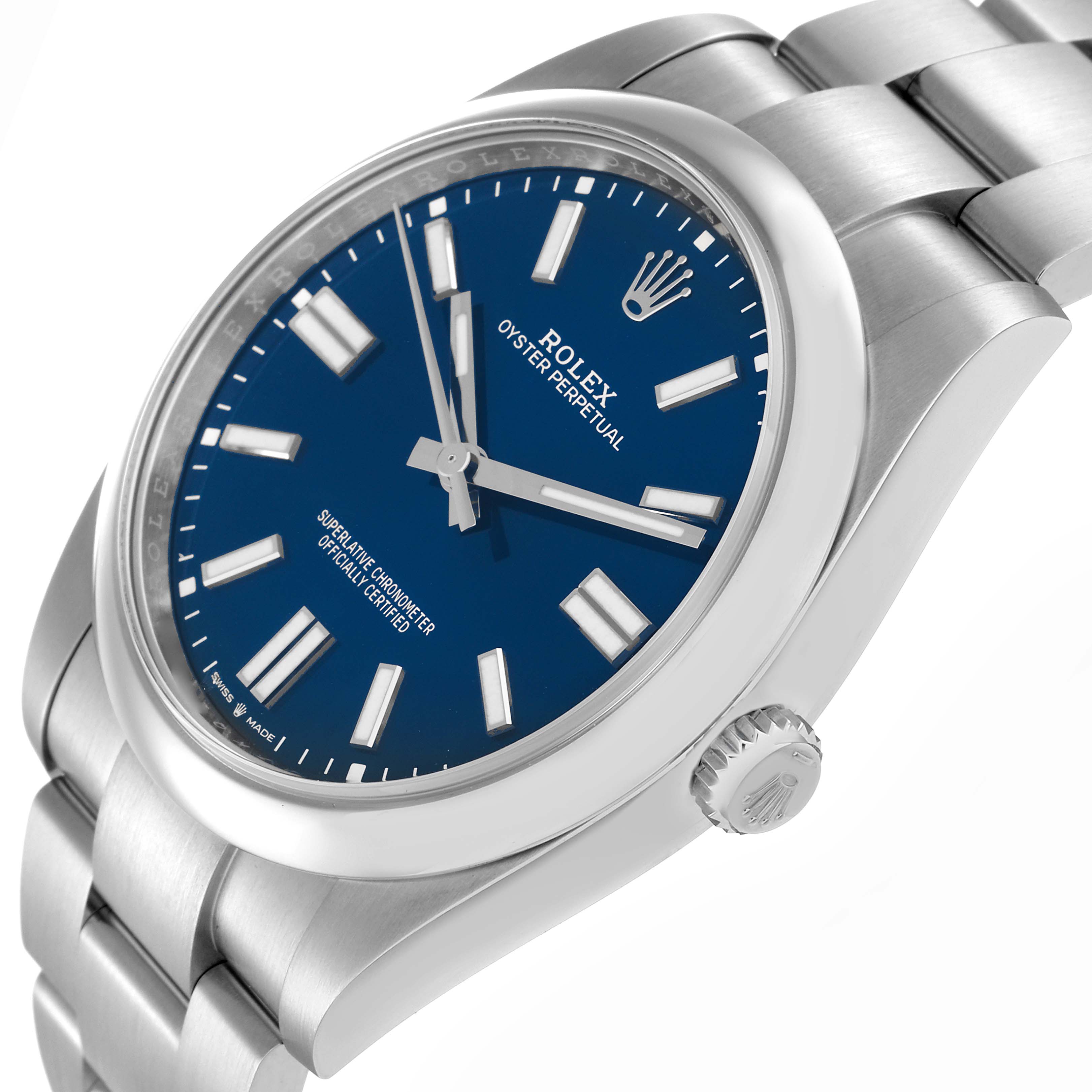 The image shows a Rolex Oyster Perpetual model 124300 men
s watch at an angled side view, highlighting its blue dial, hour markers, crown, and stainless steel bracelet.