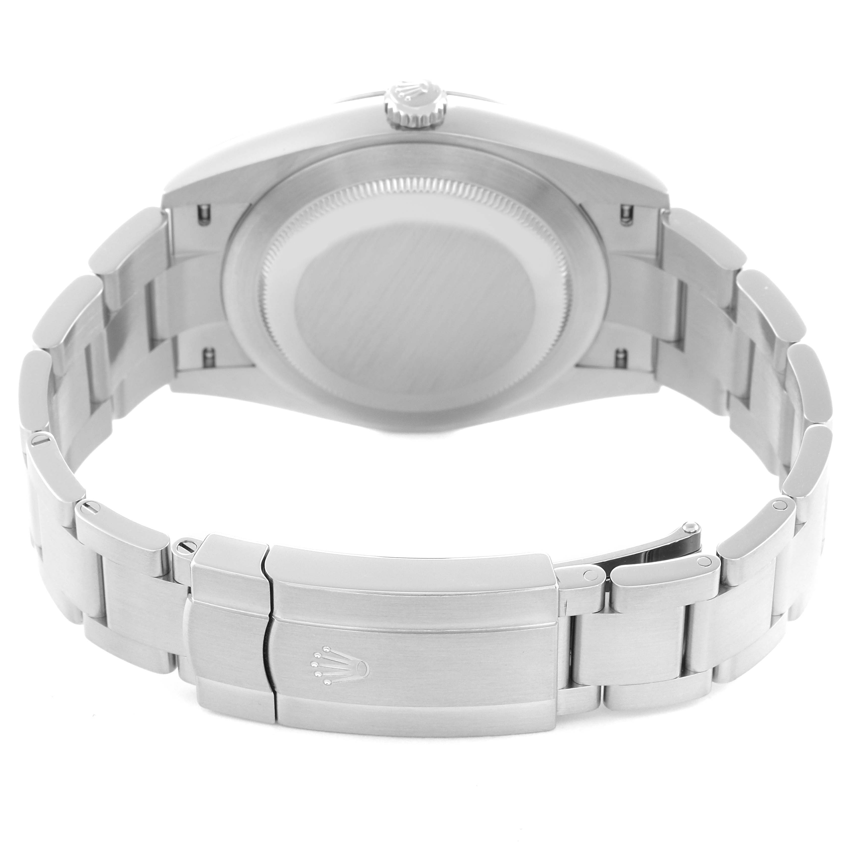 The image shows the back view of a Rolex Oyster Perpetual 124300 men
s watch, highlighting the case back, crown, and clasp of the bracelet.