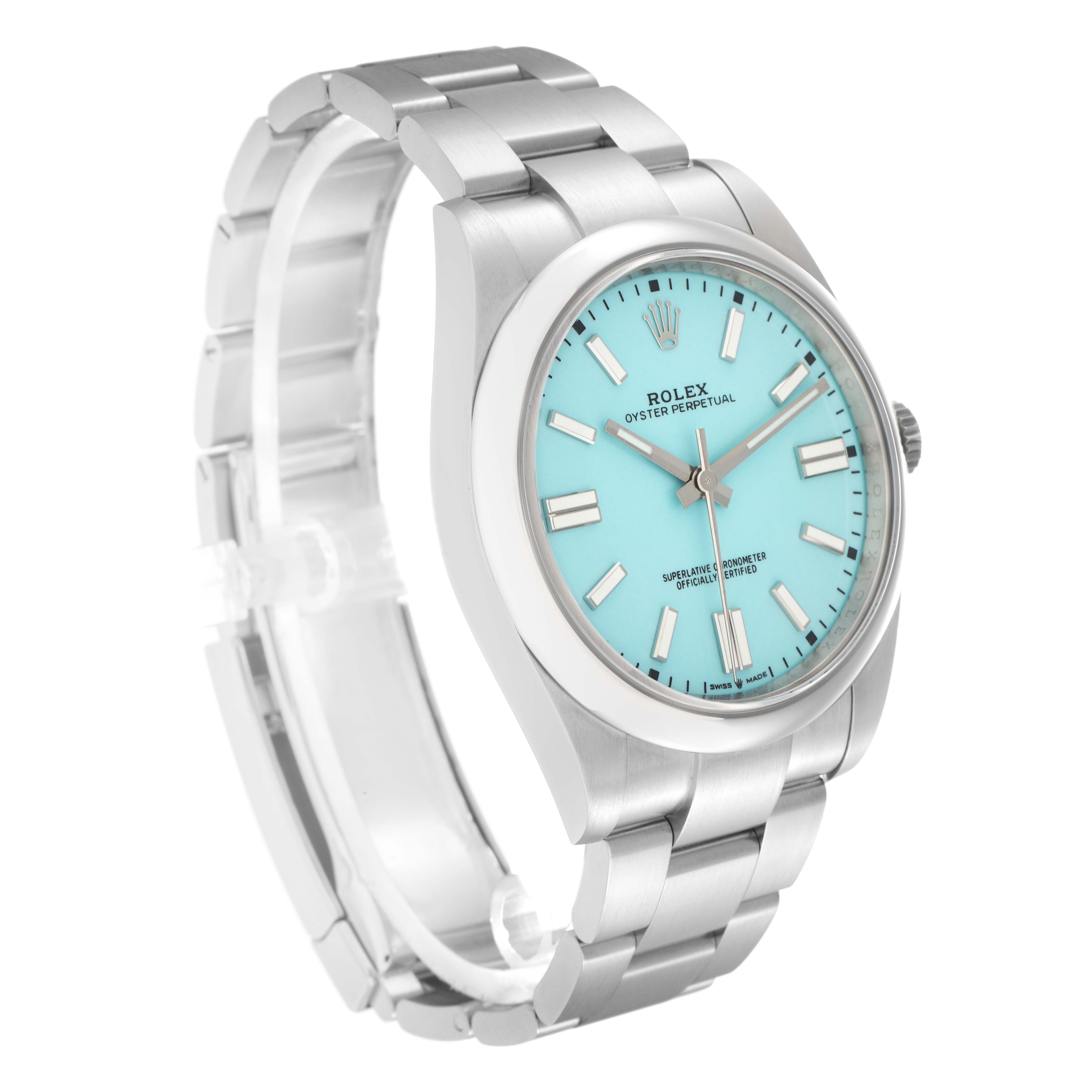 The Rolex Oyster Perpetual model 124300 is shown at a three-quarter angle, highlighting its bezel, dial, and bracelet.