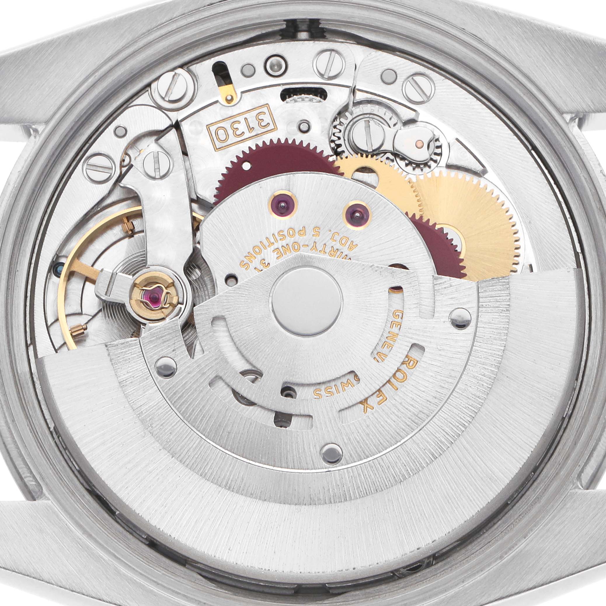 This image shows the movement of a Rolex Air-King model 114210 watch from the back, highlighting gears and mechanical components.