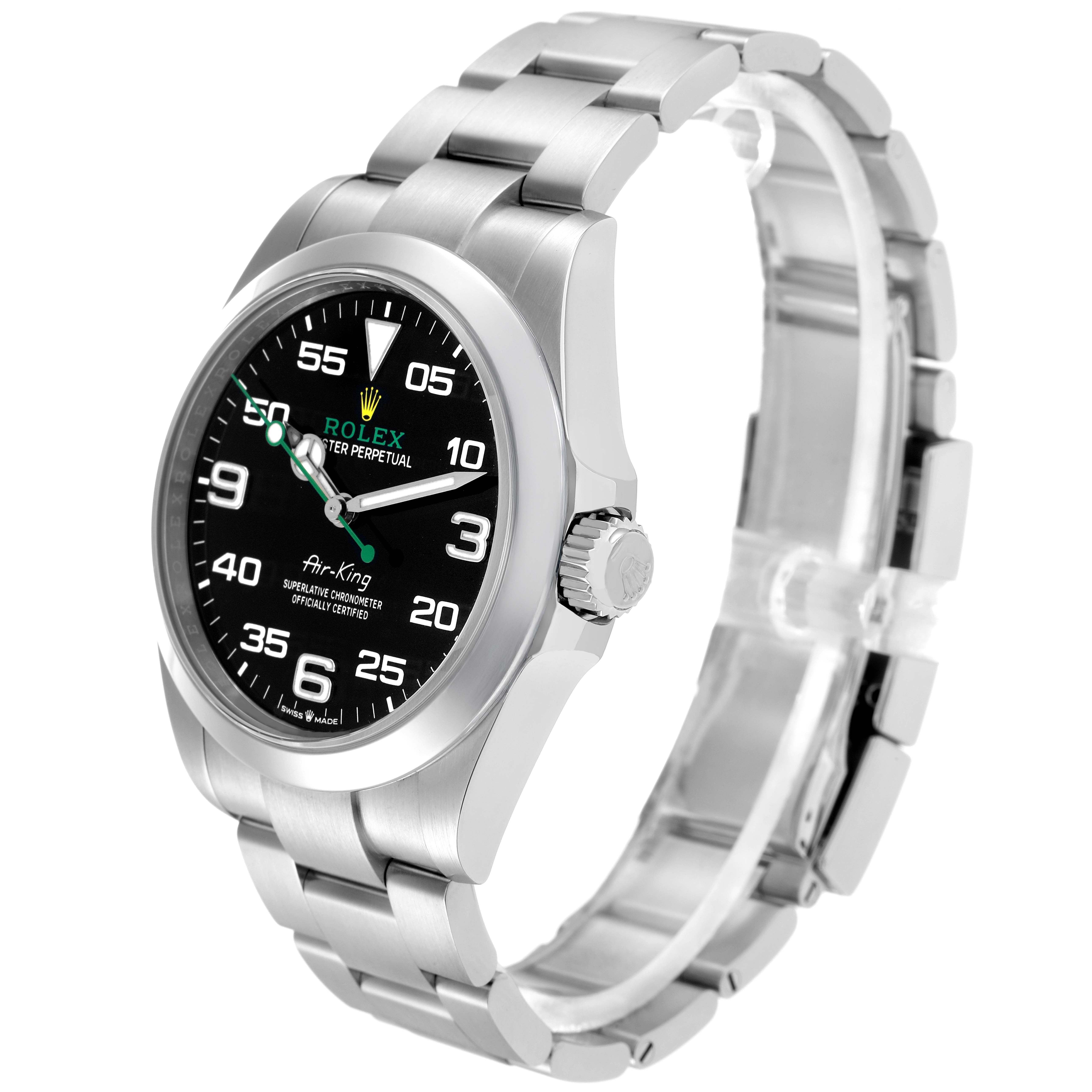 The Rolex Air-King model 126900 is shown at a three-quarter angle, highlighting the dial, case, crown, and part of the bracelet.