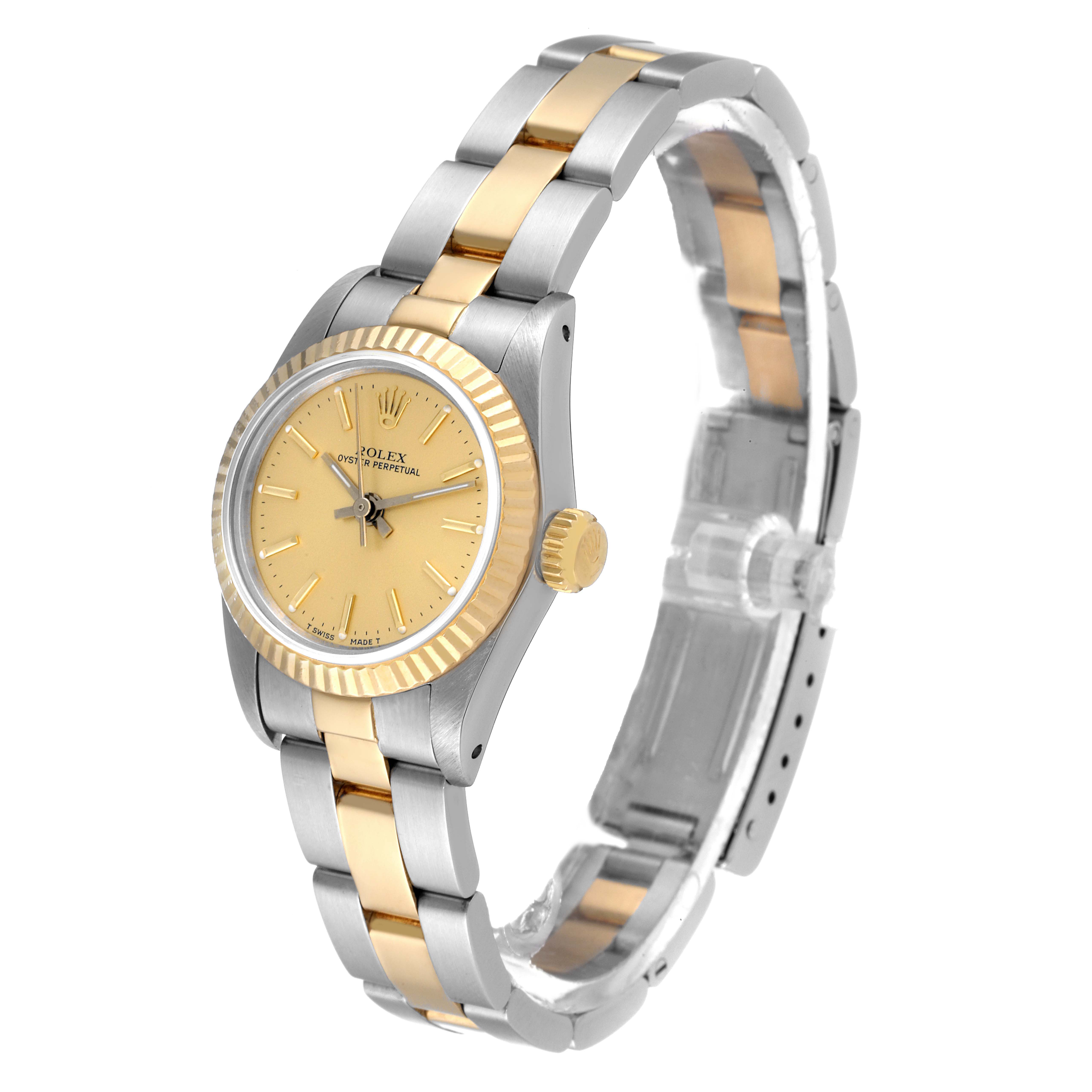 The image shows a side view of a Rolex Oyster Perpetual 67193 Women's Steel and Gold (two tone) Champagne Dial 67193 Women's Steel and Gold (two tone) Champagne Dial watch featuring a two-tone band and a fluted bezel.