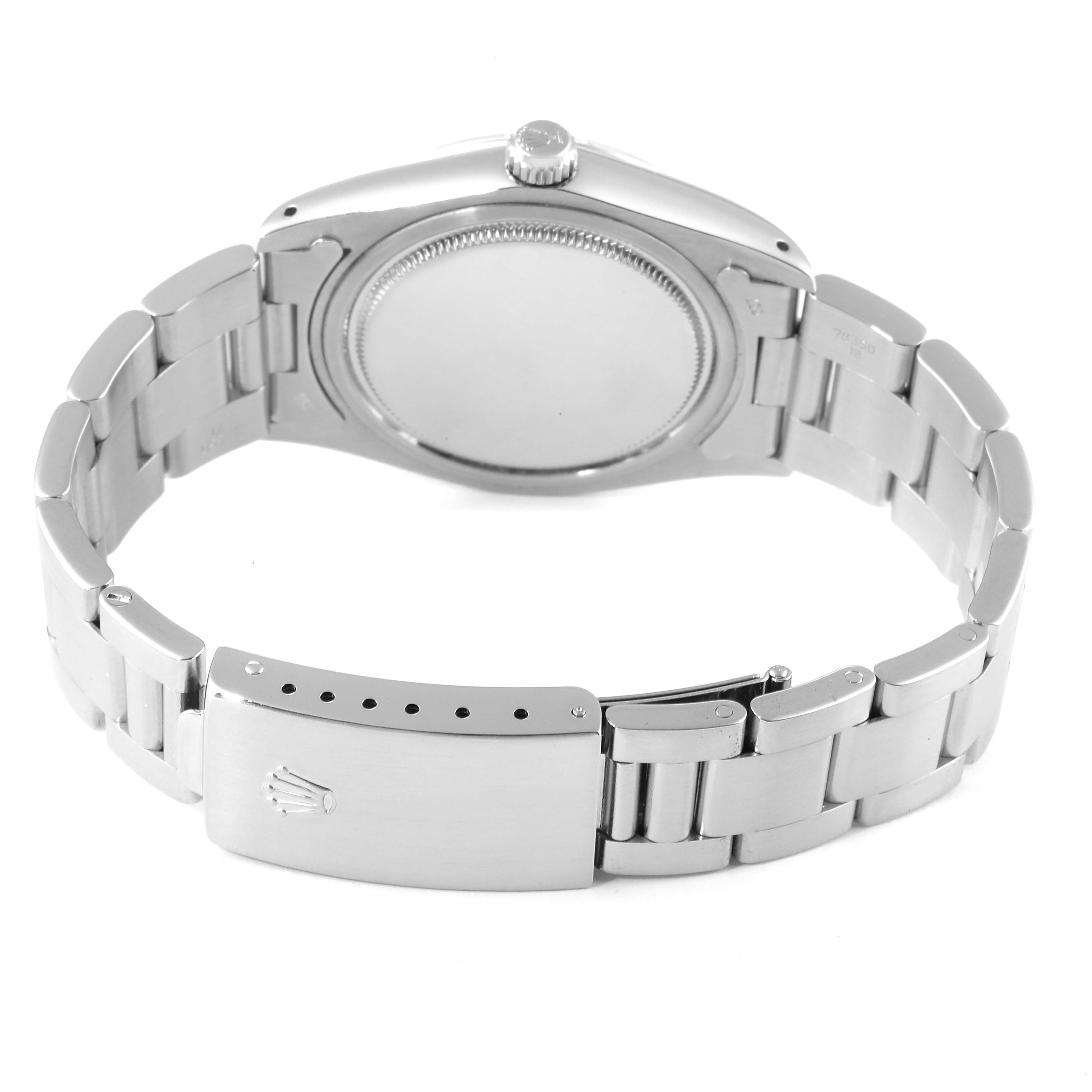 This is the rear view of the Rolex Vintage Collection 6694 Men's Stainless Steel Silver Dial 6694 Men's Stainless Steel Silver Dial watch showcasing the closed bracelet and case back.