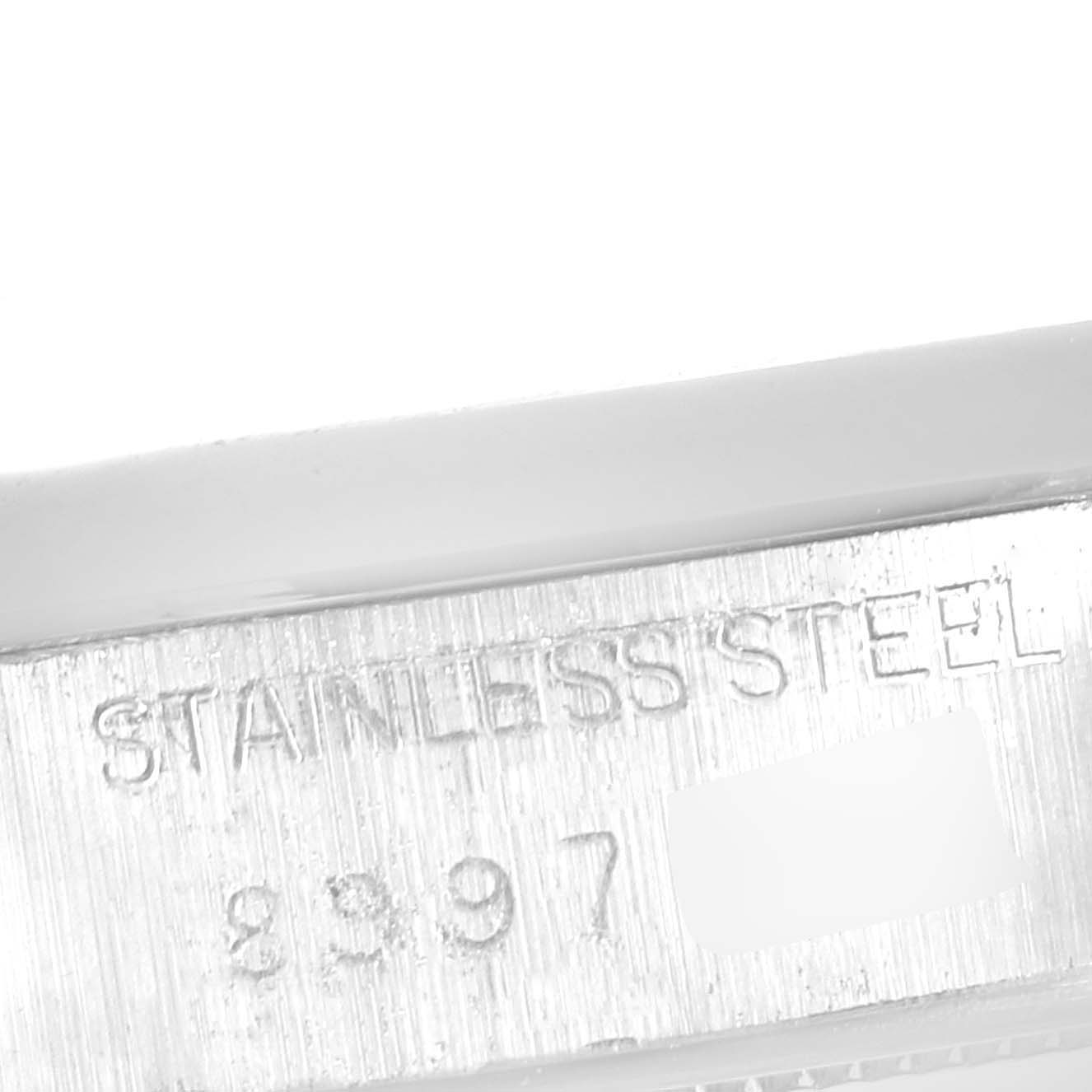 This image shows a close-up of the stainless steel casing on the Rolex Vintage Collection 6694 Men's Stainless Steel Silver Dial 6694 Men's Stainless Steel Silver Dial model watch.