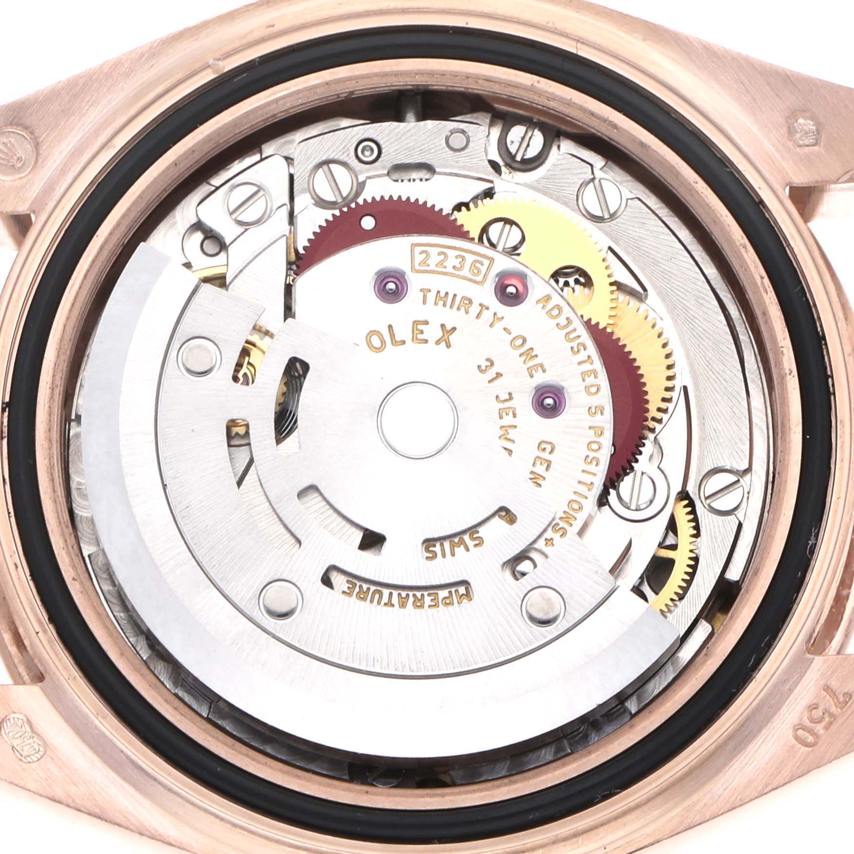 This image shows the movement mechanism of a Rolex President model, model number 279135, viewed from the caseback with gears and components visible.