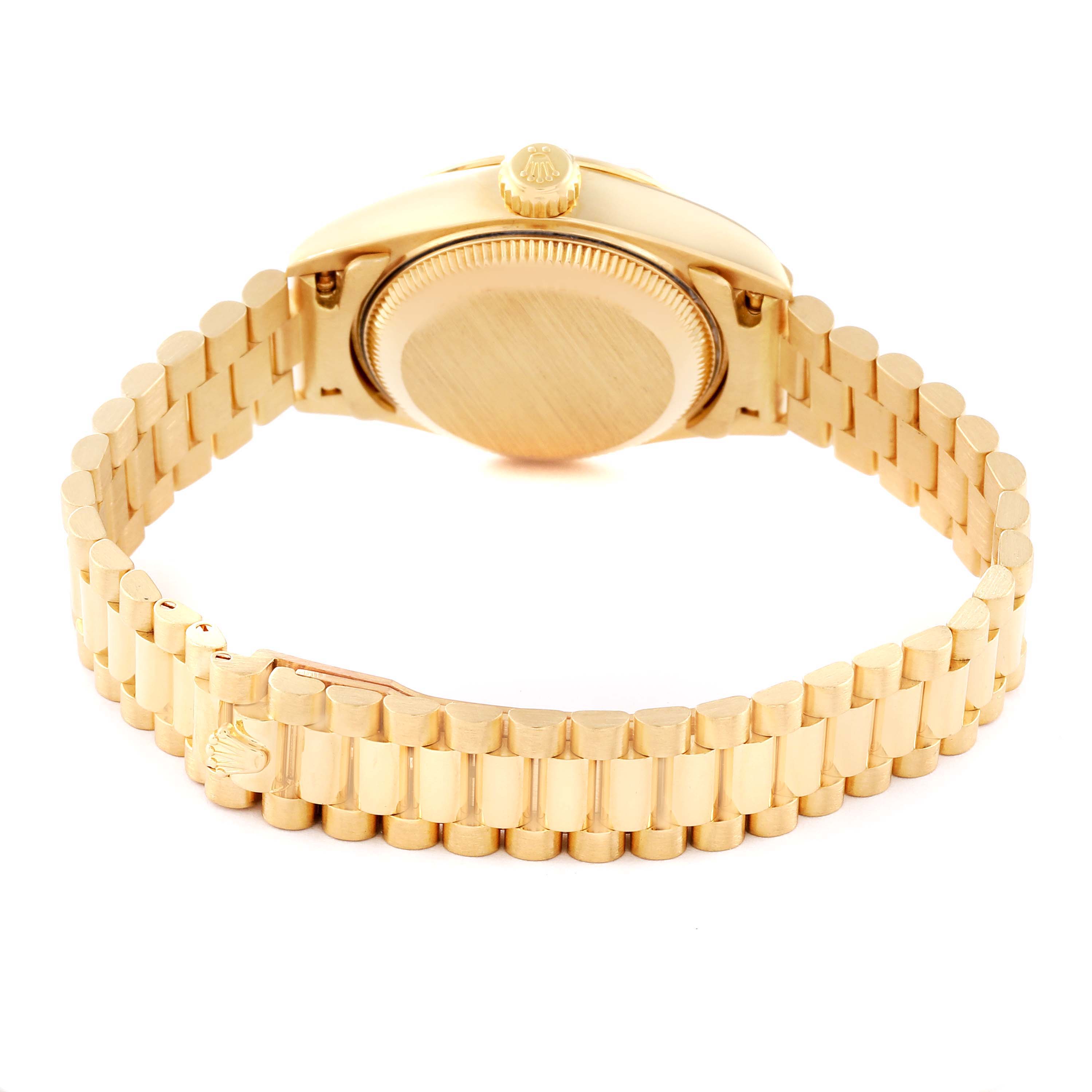 This image shows the back of a Rolex President 79258 Women's Yellow Gold Mother of Pearl Dial 79258 Women's Yellow Gold Mother of Pearl Dial model watch, featuring its rear case and gold bracelet.