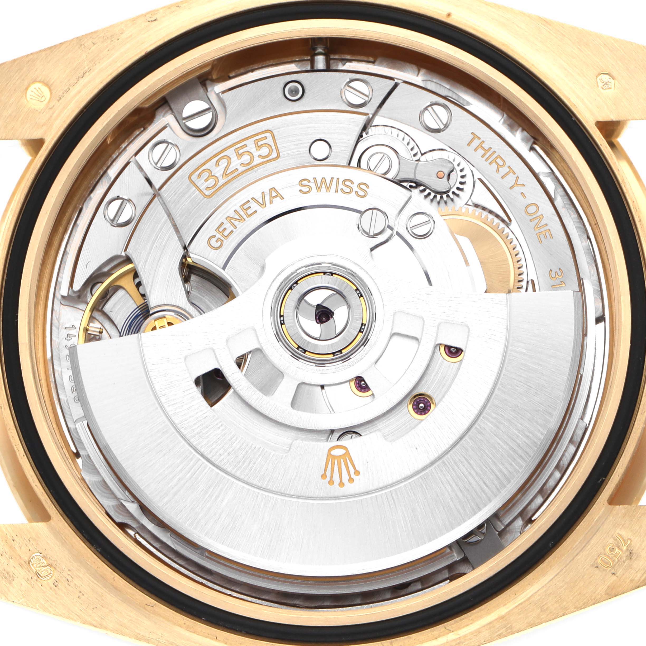 The image shows the movement of a Rolex President model watch, model number 228238, viewed from the back, highlighting intricate internal components.