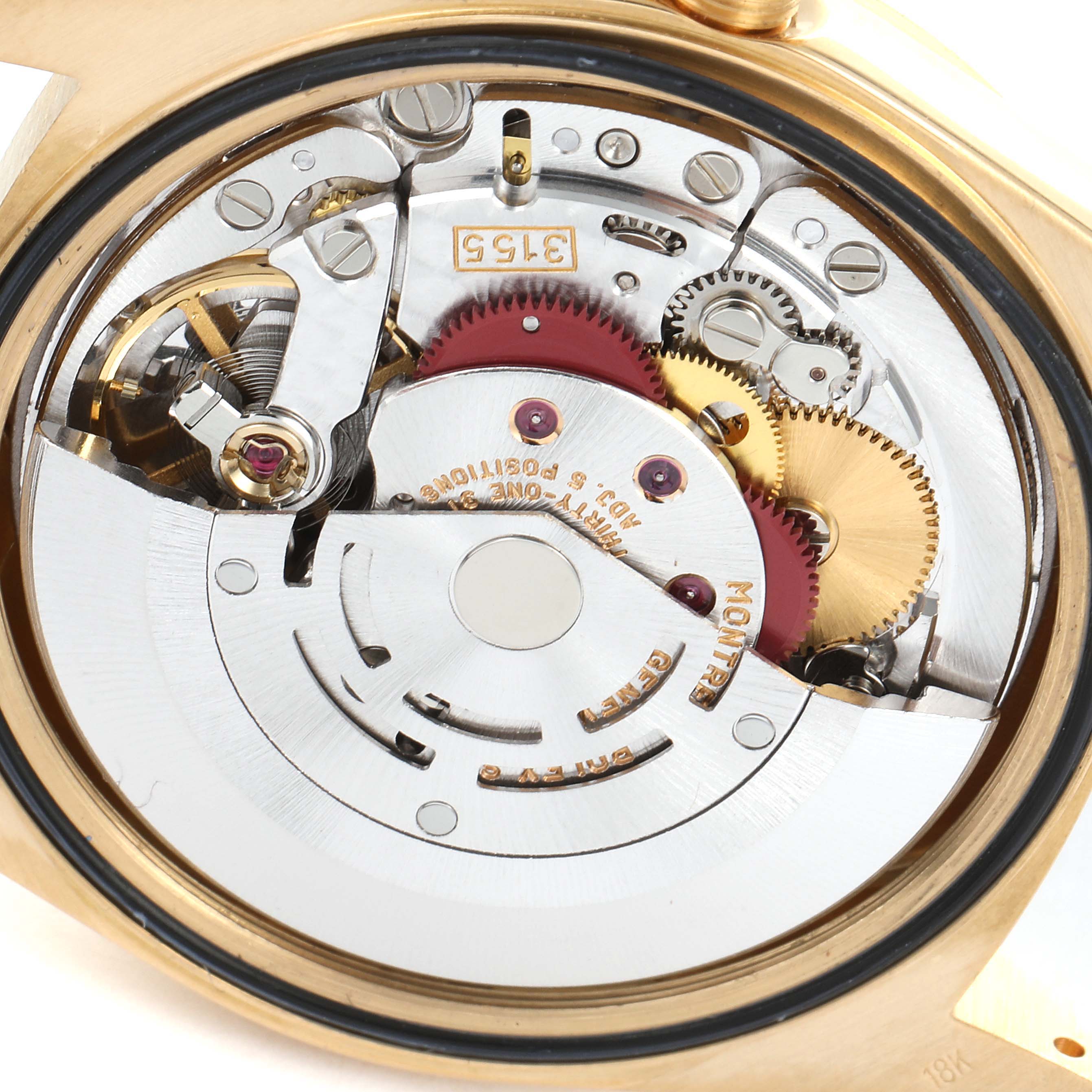 This is a close-up view of the movement of a Rolex President 18238 Men
s Yellow Gold Silver Dial 18238 Men
s Yellow Gold Silver Dial model watch, showing its intricate gears and components.