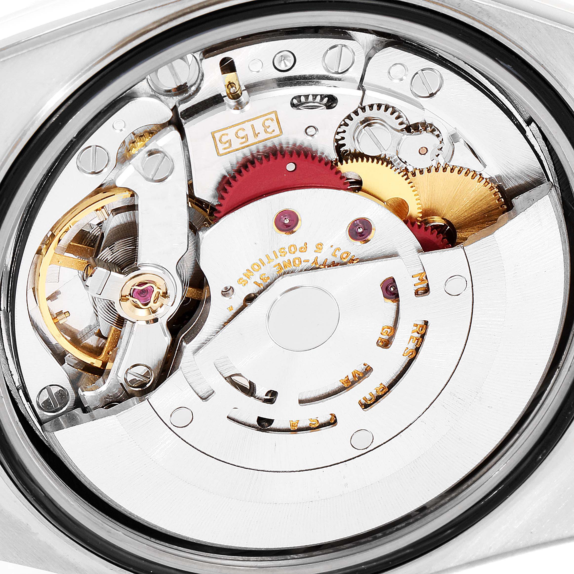 The image shows a close-up view of the internal movement components of a Rolex President 18239 Men's White Gold Brown Dial 18239 Men's White Gold Brown Dial model watch, highlighting gears and mechanisms.