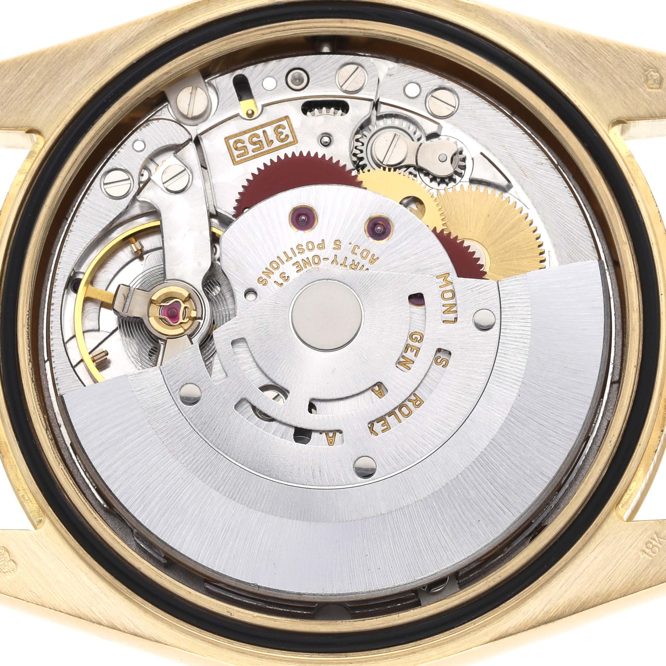 The image shows a close-up of the movement inside the Rolex Date model 118238, displaying its intricate gears and mechanical components.