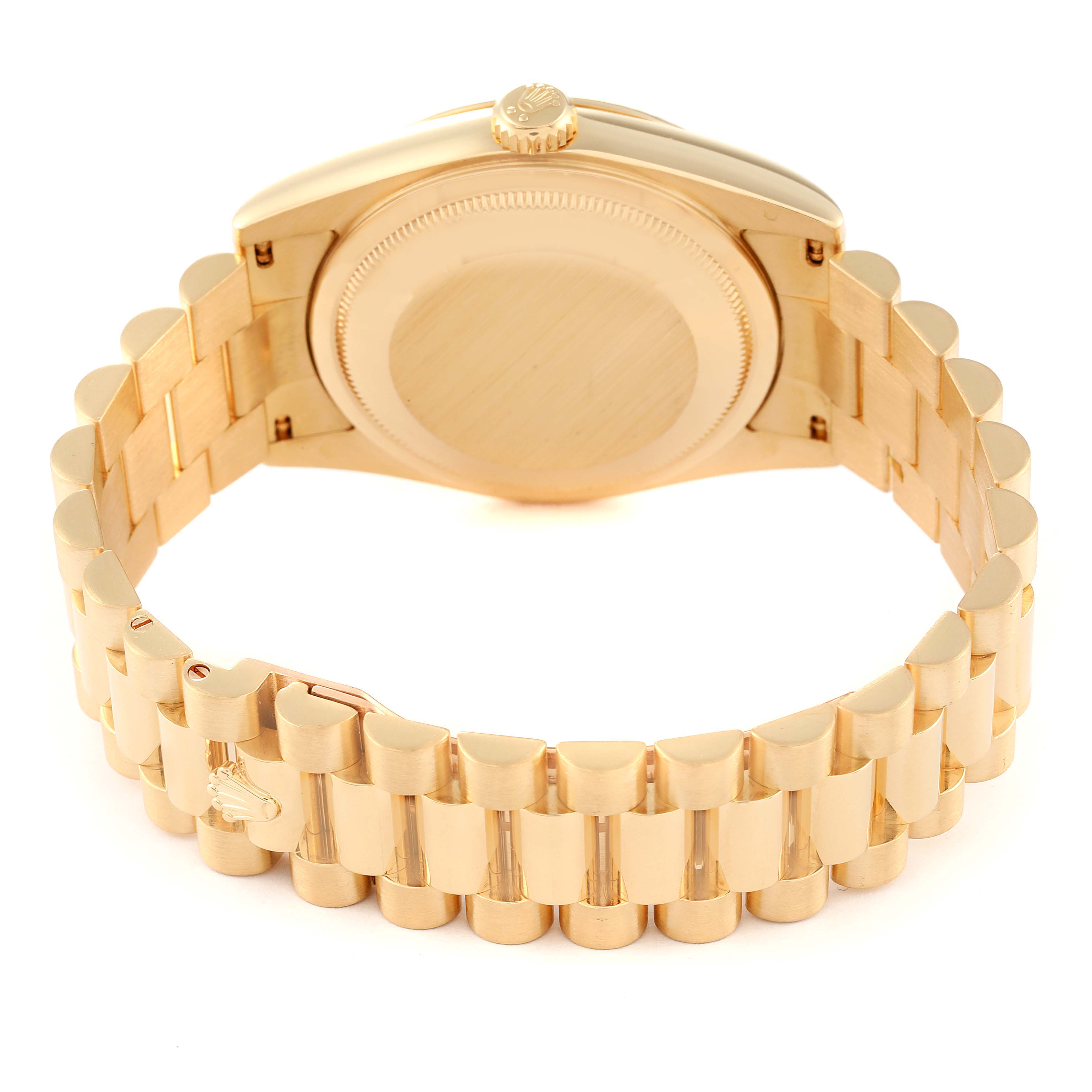 This image shows the back and bracelet of a Rolex President 118238 Men
s Yellow Gold Champagne Dial 118238 Men
s Yellow Gold Champagne Dial model watch, focusing on its clasp and crown.