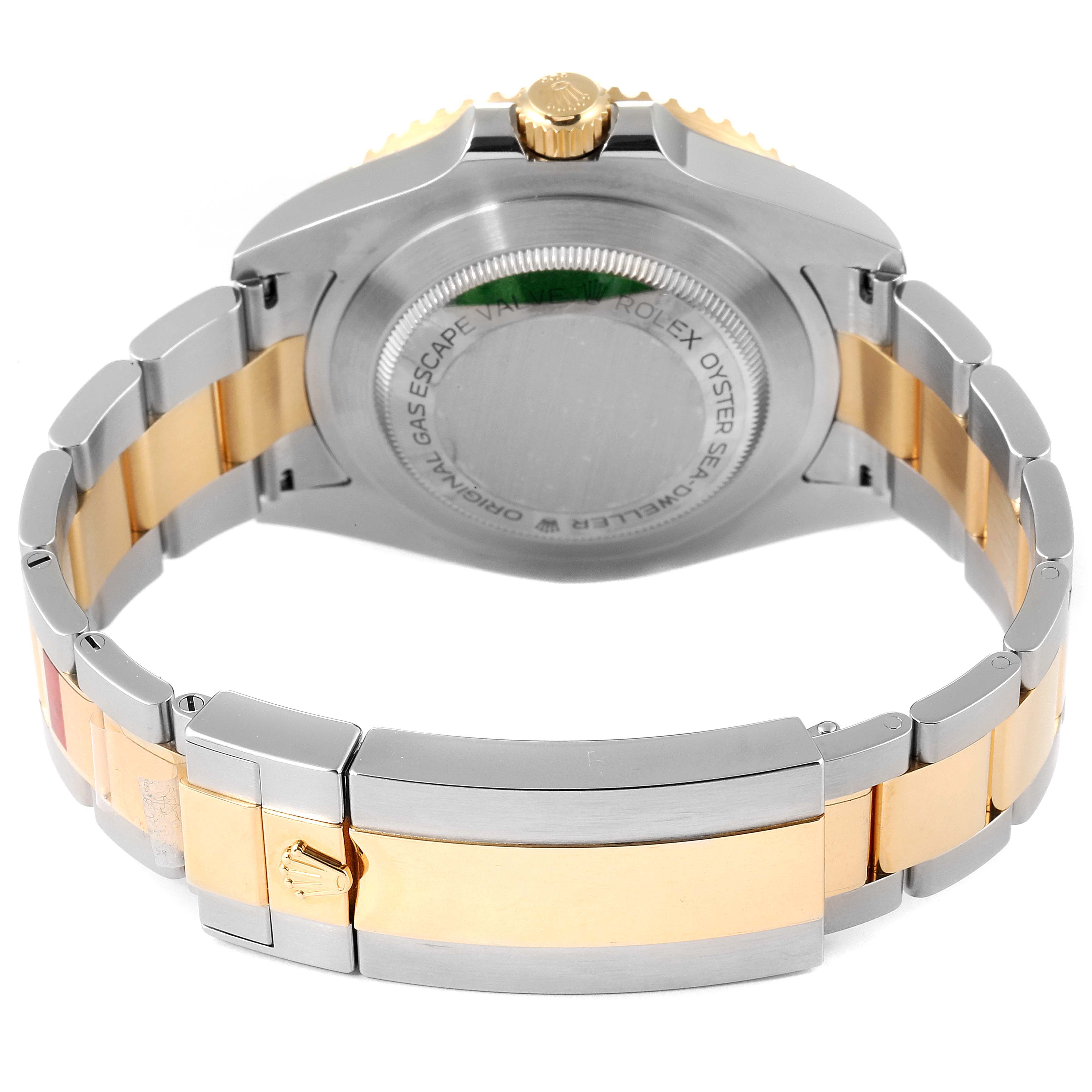 The image shows the backside and bracelet of a Rolex Sea-Dweller 126603 Men's Steel and Gold (two tone) Black Dial 126603 Men's Steel and Gold (two tone) Black Dial watch, focusing on the case back and clasp.