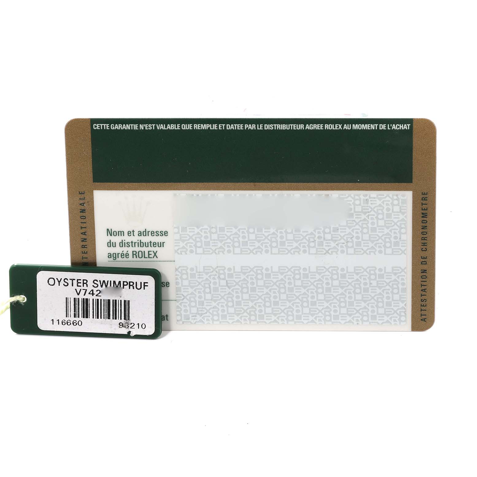 The image shows a warranty card and tag for a Rolex Sea-Dweller 116660 Men
s Stainless Steel Black Dial 116660 Men
s Stainless Steel Black Dial watch, including the terms of guarantee and model information.