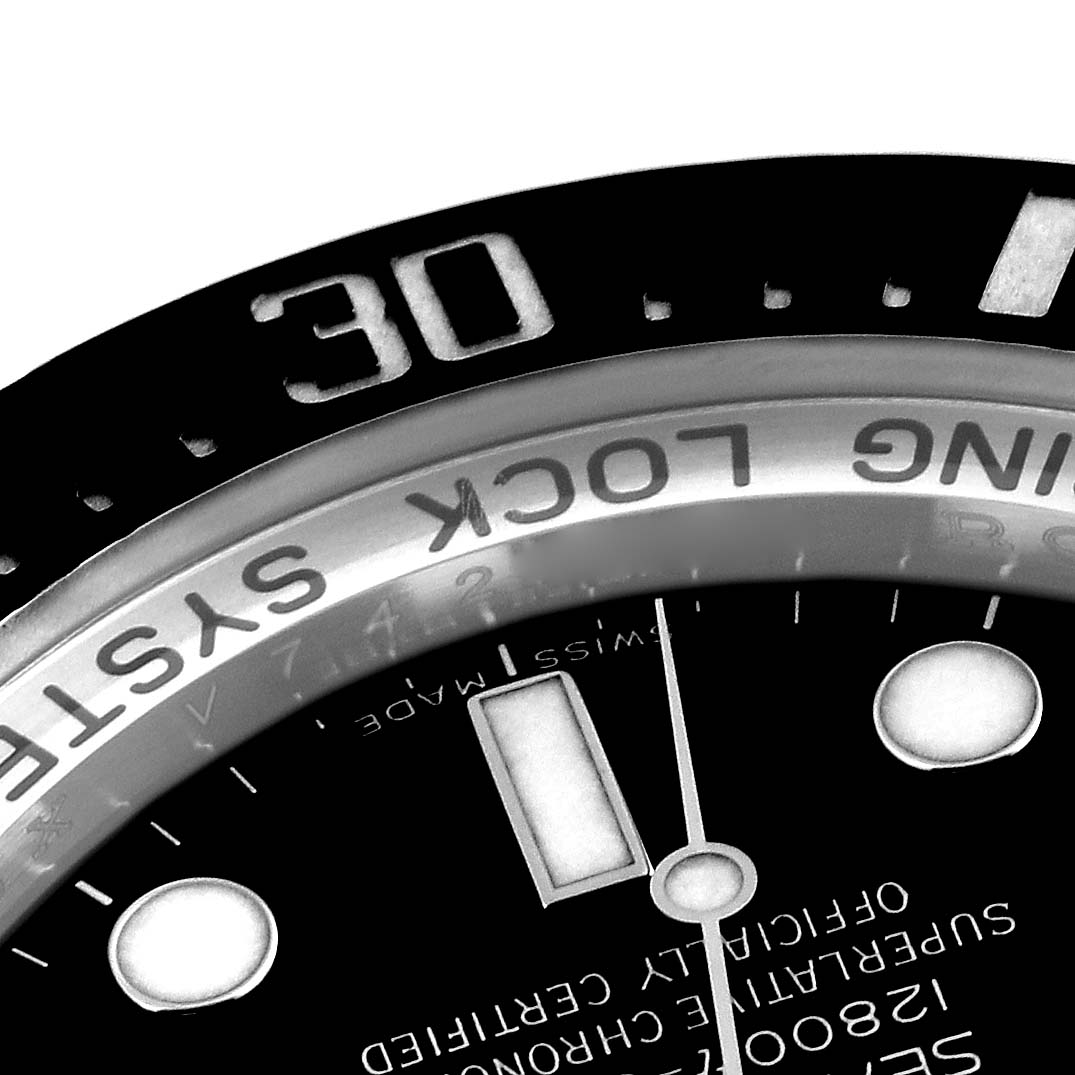 Close-up of the bezel and dial of the Rolex Sea-Dweller 116660 Men
s Stainless Steel Black Dial 116660 Men
s Stainless Steel Black Dial watch, showing the minute markers and text "RING LOCK SYSTEM."