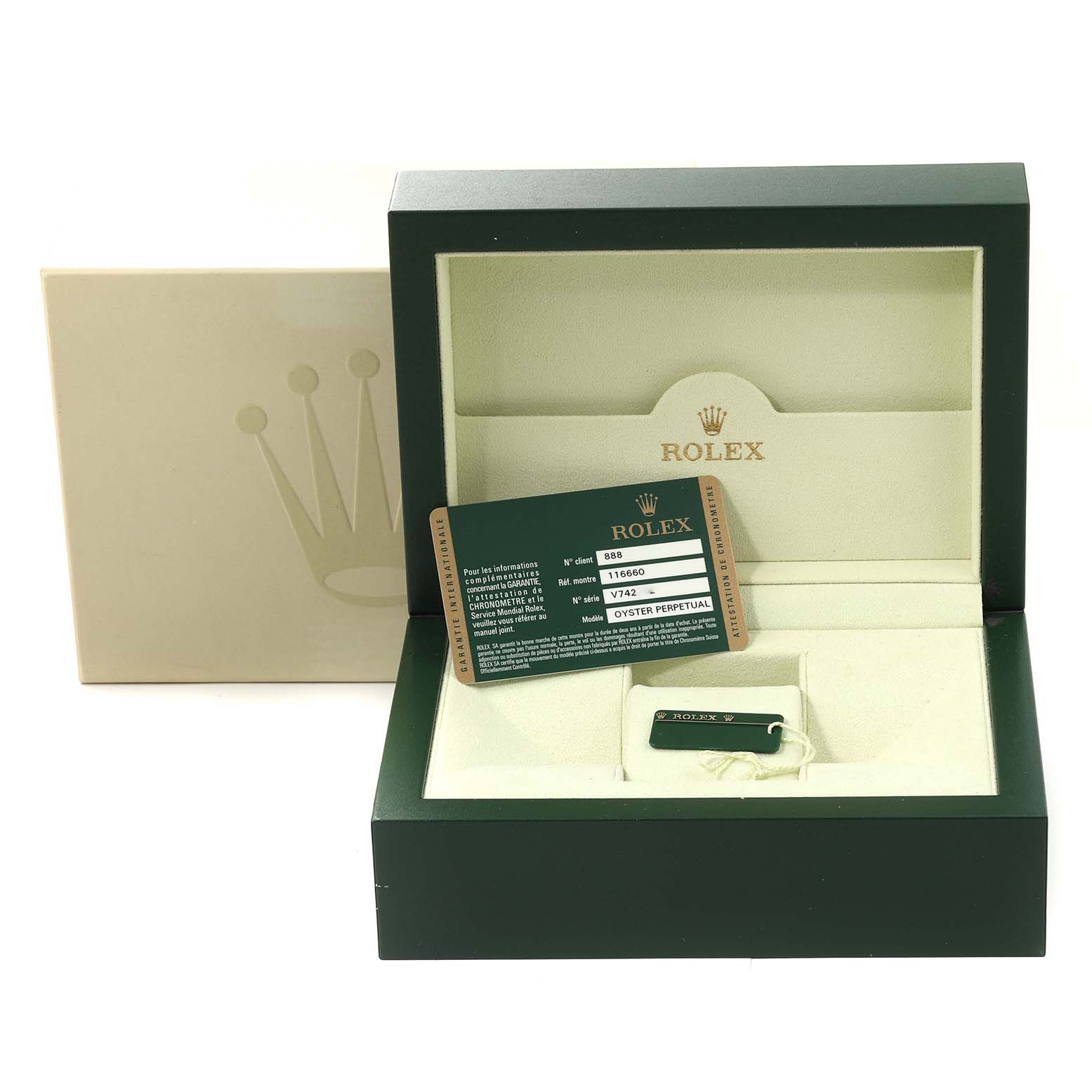 This image shows the packaging and accessories, including the tag and warranty card, for a Rolex Sea-Dweller 116660 Men
s Stainless Steel Black Dial 116660 Men
s Stainless Steel Black Dial watch.