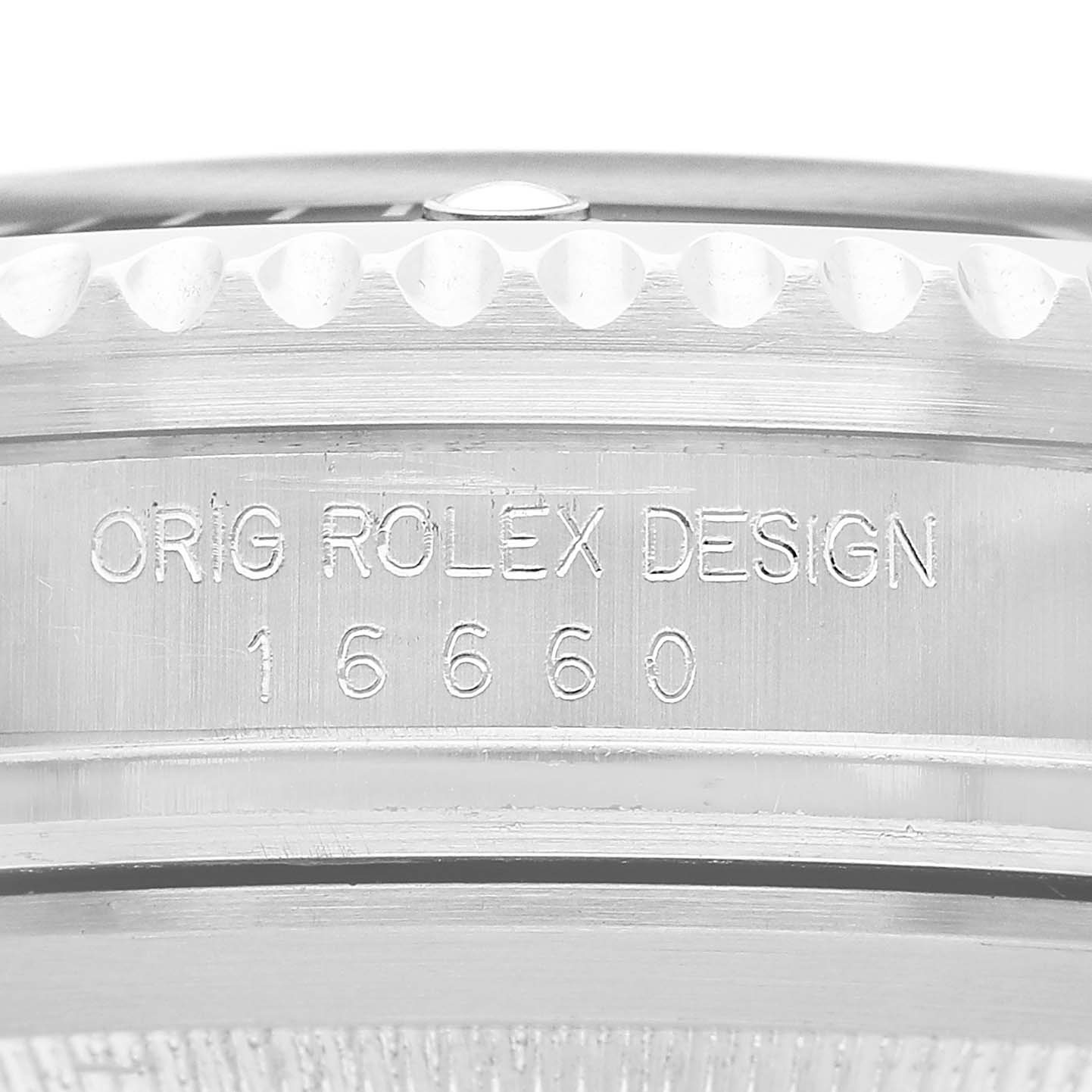 The image shows the engraved case side of a Rolex Sea-Dweller 16660 Men's Stainless Steel Black Dial watch, featuring model number 16660 and "ORIG ROLEX DESIGN."
