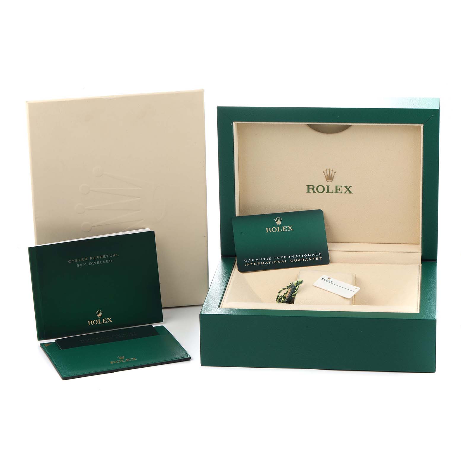 The image shows the packaging for a Rolex Sky-Dweller model 326138, including the box, guarantee card, and booklet, viewed from the front.
