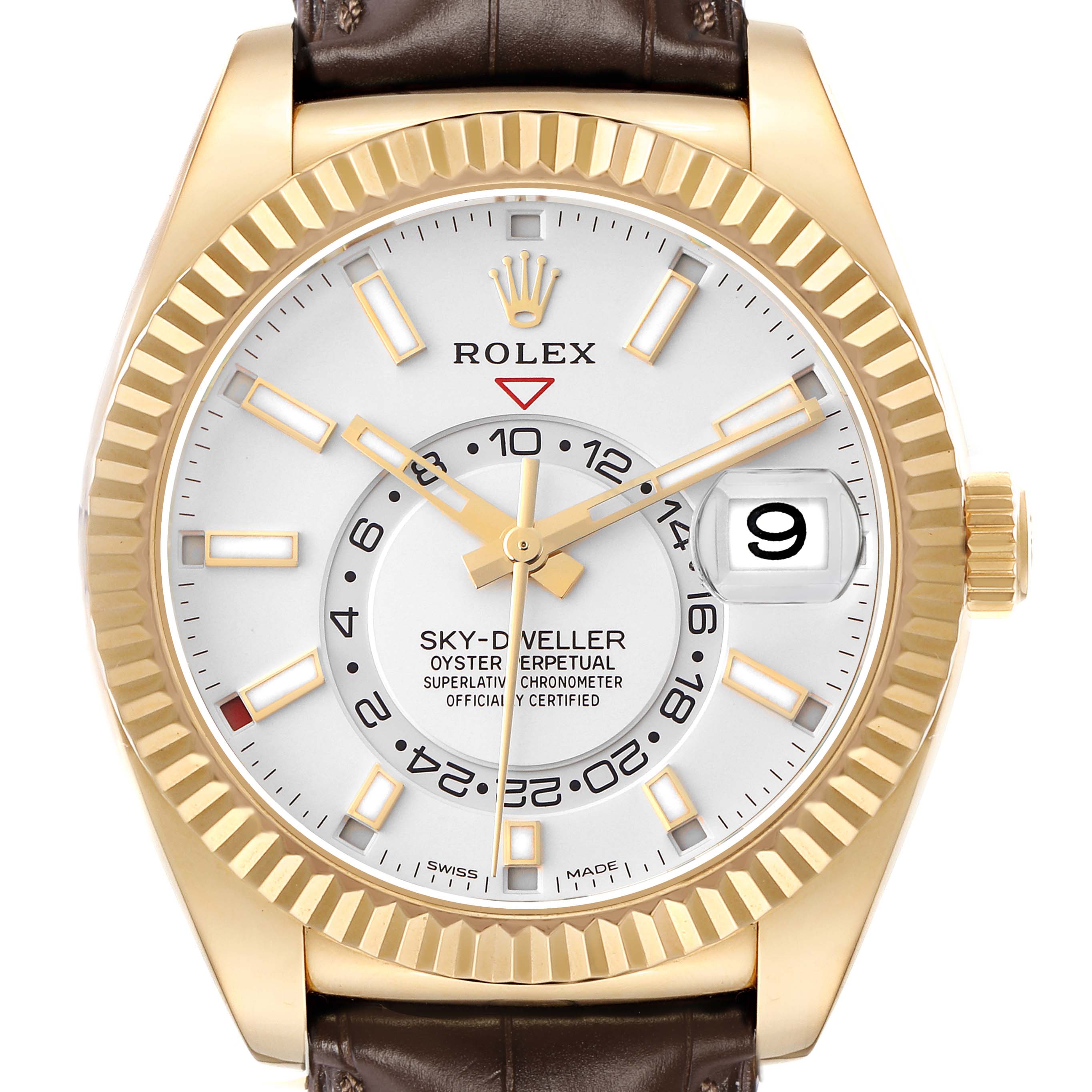 The image shows a Rolex Sky-Dweller model 326138 from the front, displaying its face, fluted bezel, and brown leather strap.