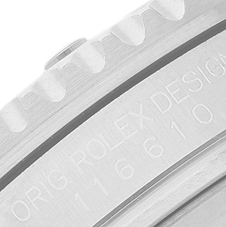 This close-up image shows the side of the bezel and the engraving on the casing of a Rolex Submariner 116610 Men
s Stainless Steel Black Dial 116610 Men
s Stainless Steel Black Dial watch.