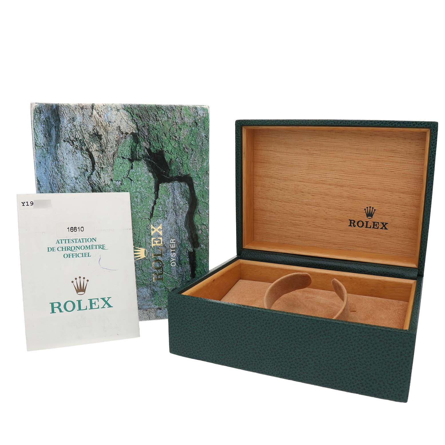 The image shows a Rolex Submariner 16610 Men's Stainless Steel Black Dial box and papers, including an open watch box and a booklet.