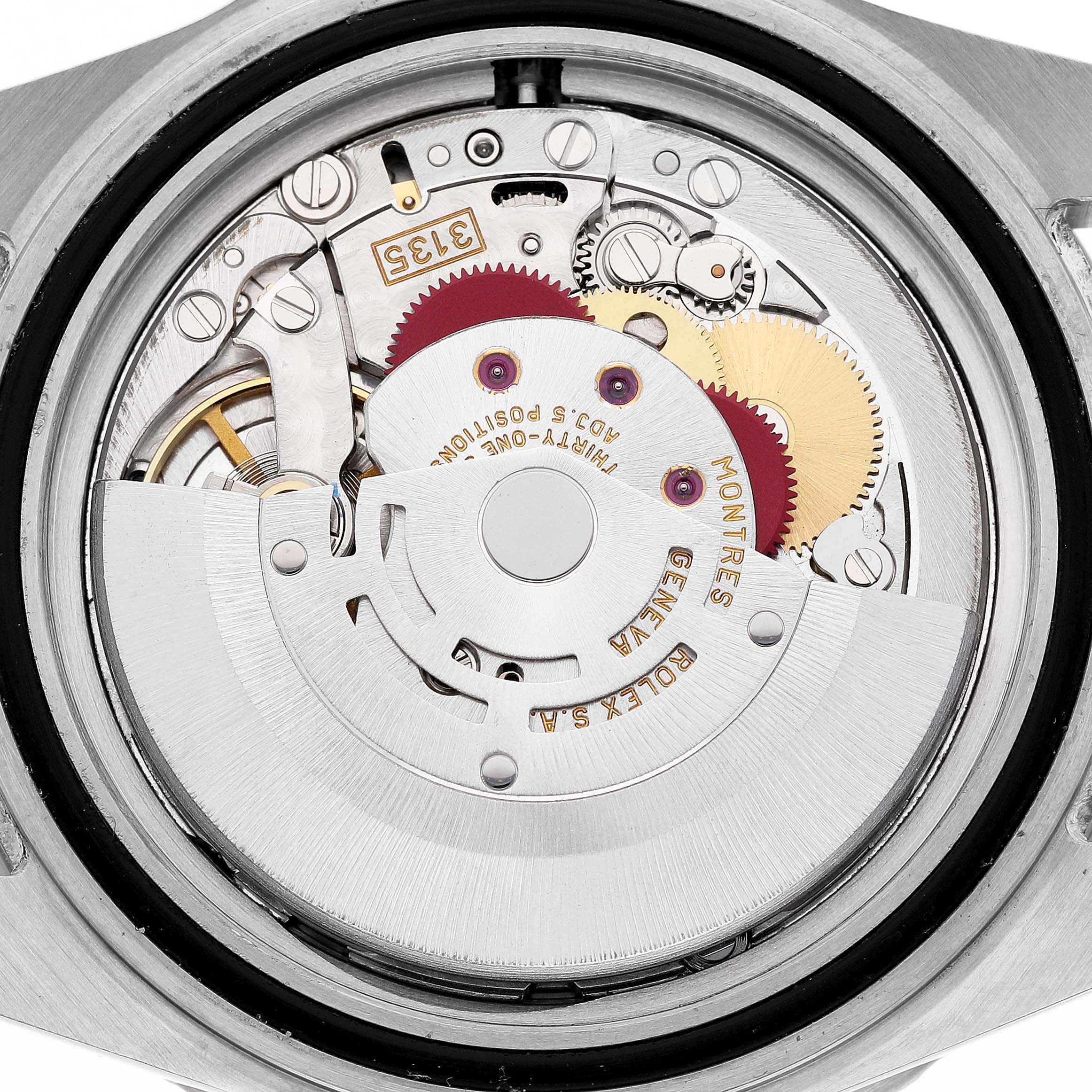 The image shows the movement of a Rolex Submariner 16610 Men's Stainless Steel Black Dial watch from the back, highlighting its internal components and mechanics.