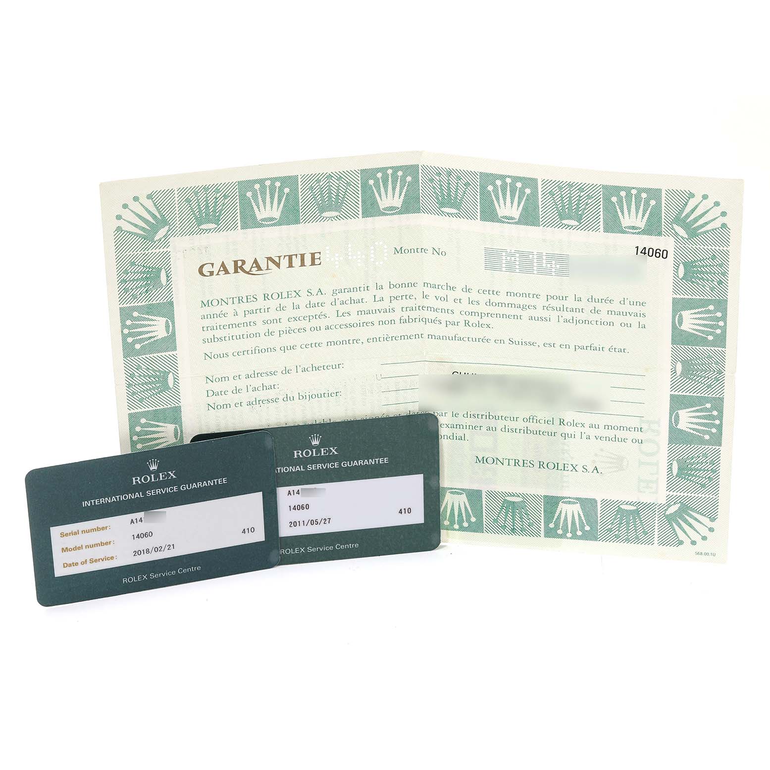 This image shows warranty cards and documents for the Rolex Submariner 14060 Men
s Stainless Steel Black Dial 14060 Men
s Stainless Steel Black Dial model.