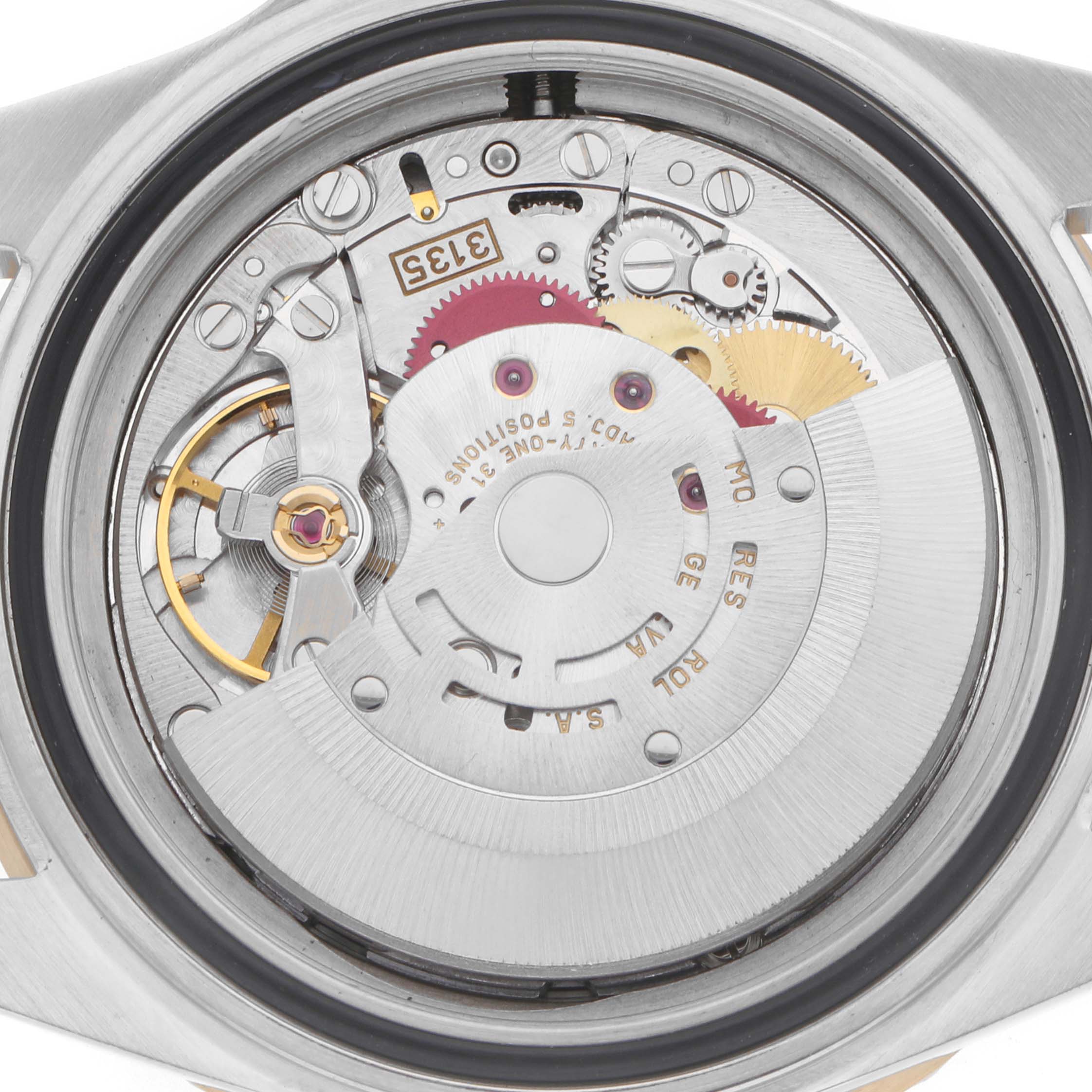 The image shows the movement of a Rolex Submariner model 16613 from a top view, highlighting gears and components.