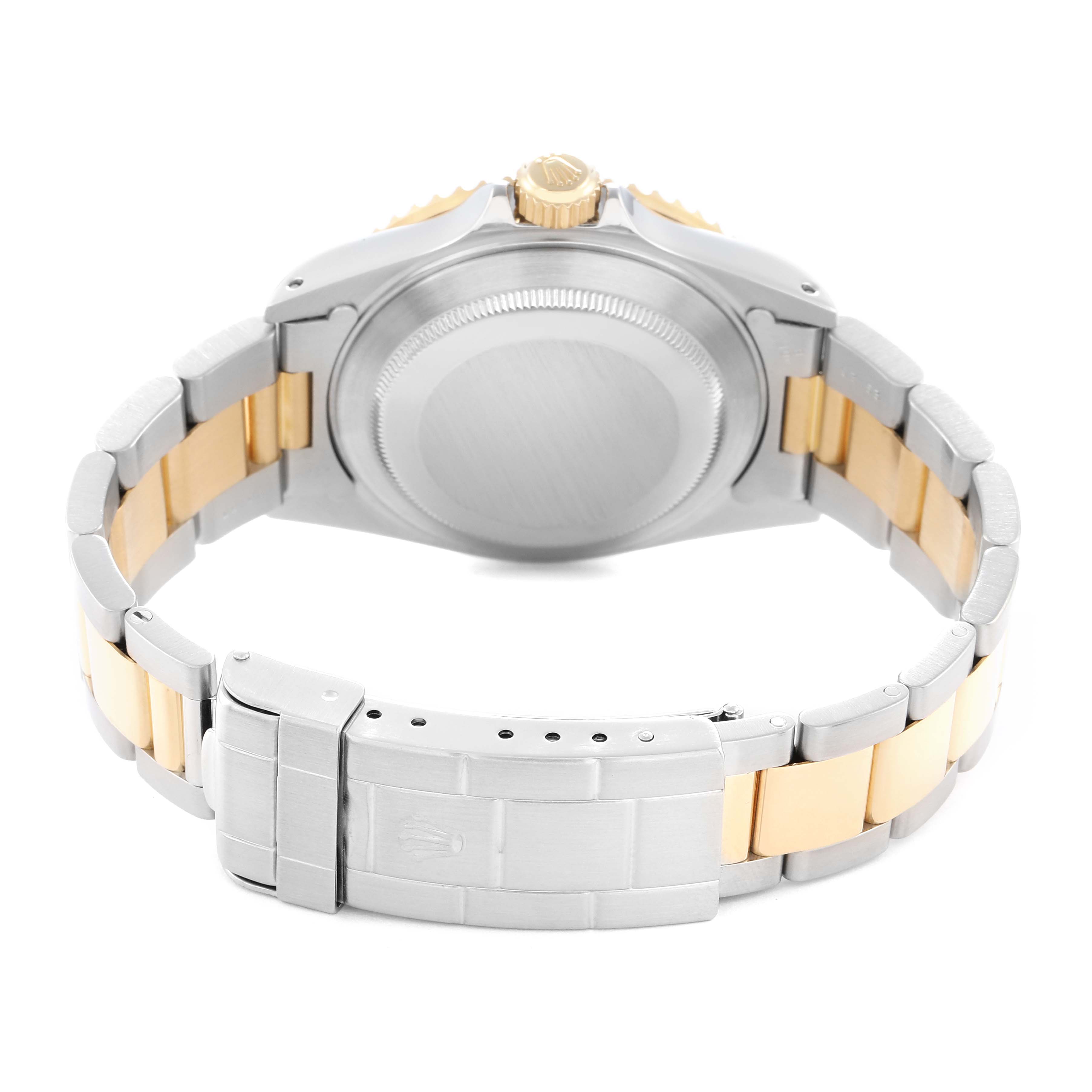 The image shows the back view of a Rolex Submariner model 16613, highlighting the case back and bracelet with a combination of silver and gold tones.