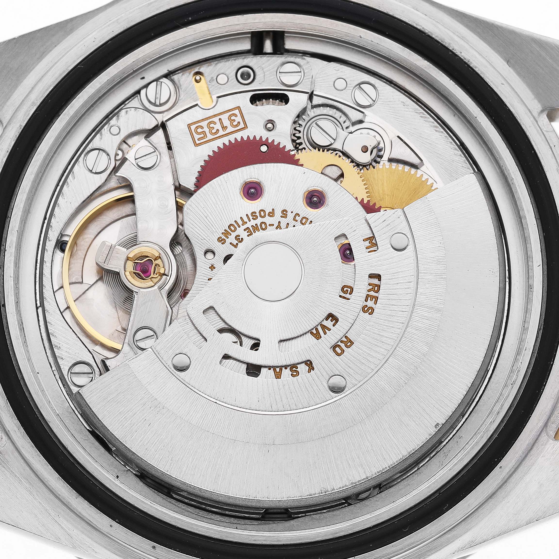 This image shows the movement and internal mechanics of a Rolex Submariner 16613 Men's Steel and Gold (two tone) Blue Dial watch from a rear view.