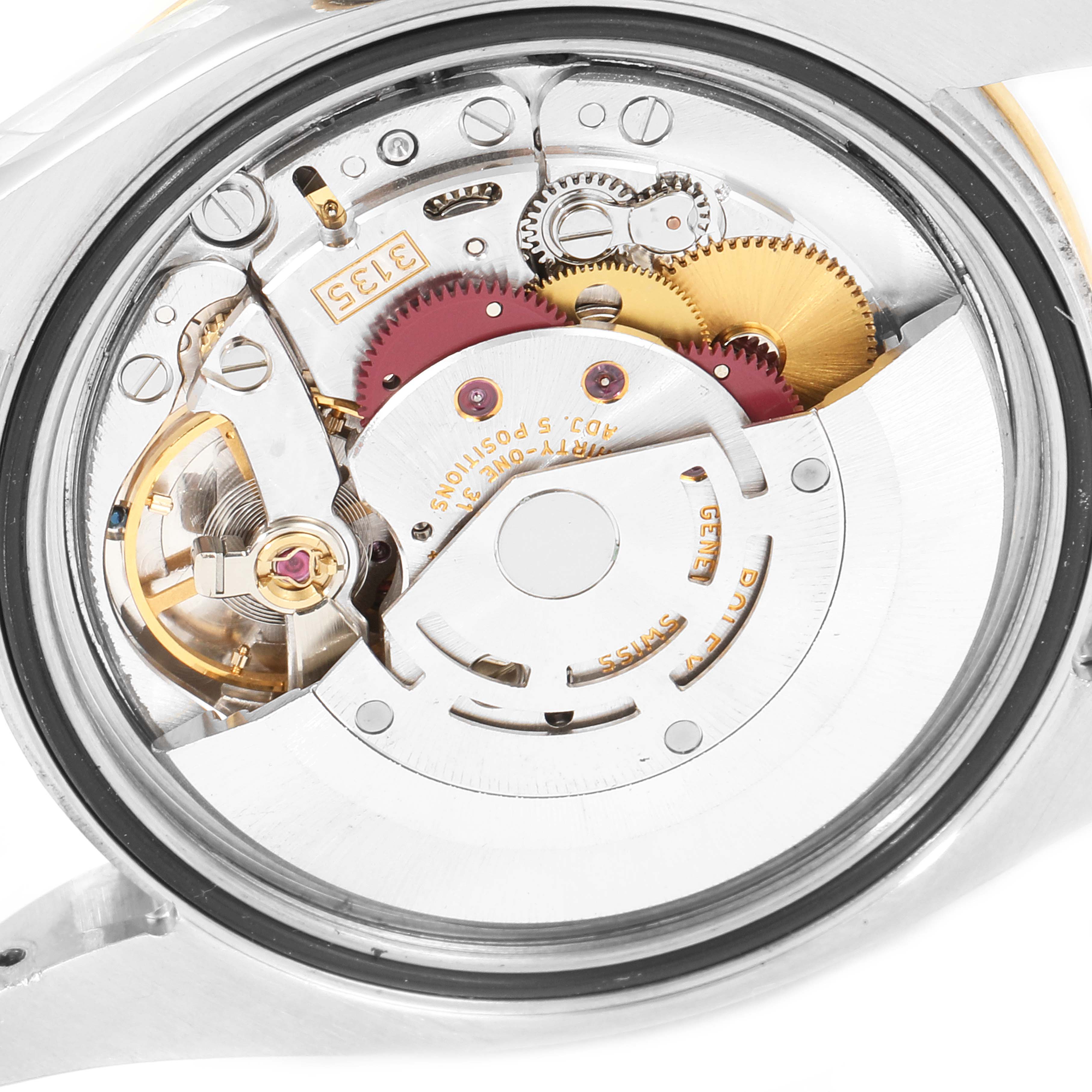 The image shows the internal movement mechanism of the Rolex Turn-o-Graph 116263 Men
s Steel and Gold (two tone) Grey Dial 116263 Men
s Steel and Gold (two tone) Grey Dial watch from a back view angle.