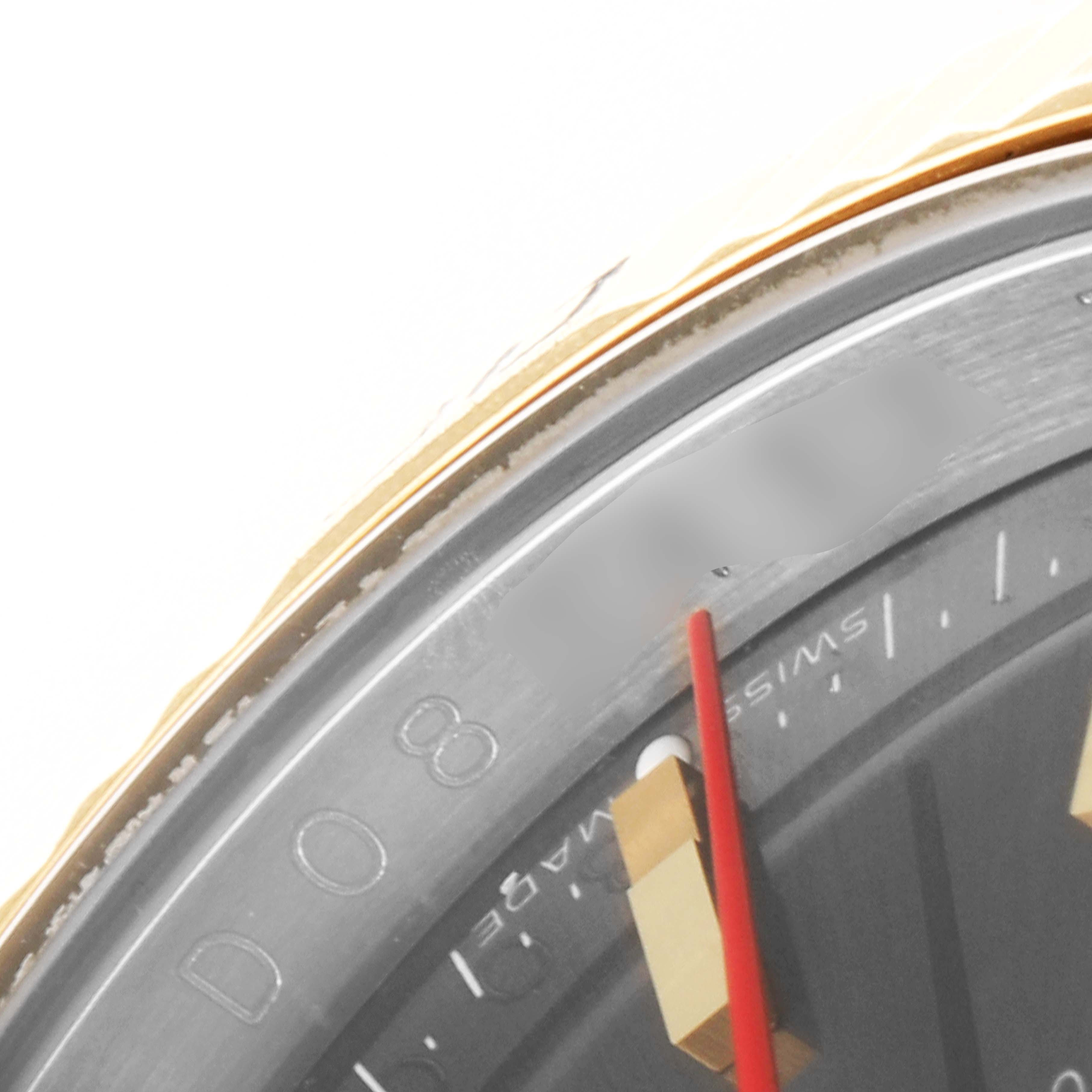 The image shows a partial close-up of the dial and bezel of the Rolex Turn-o-Graph 116263 Men
s Steel and Gold (two tone) Grey Dial 116263 Men
s Steel and Gold (two tone) Grey Dial watch.