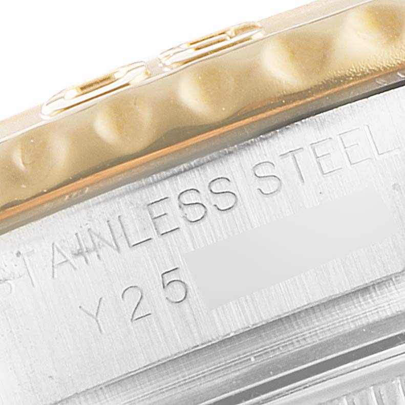 This image shows a close-up of the side of a Rolex Yacht-Master 169623 Women's Steel and Gold (two tone) White Dial 169623 Women's Steel and Gold (two tone) White Dial watch, highlighting the engraving on the stainless steel case and the edge of the bezel.