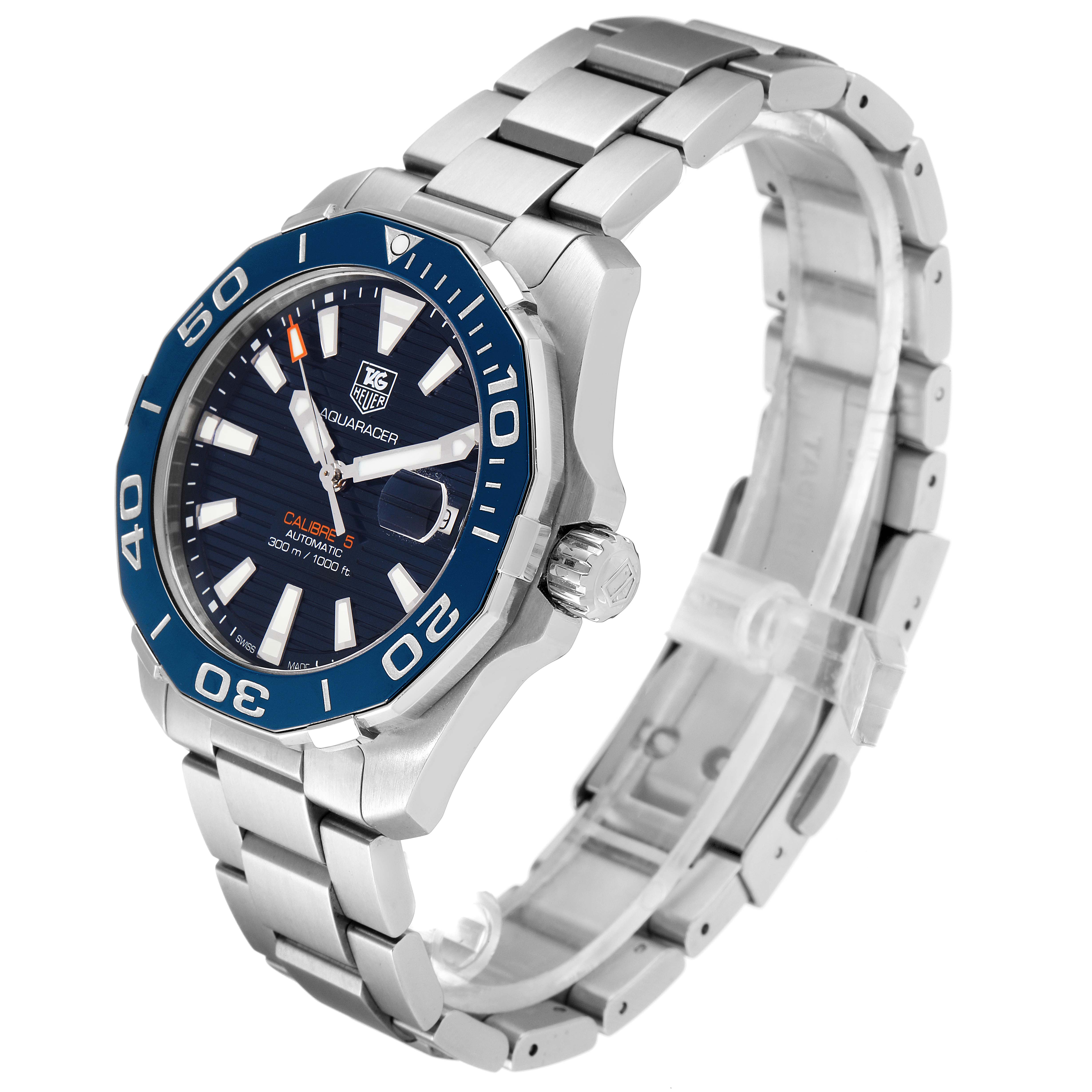The image shows a Tag Heuer Aquaracer WAY211C.BA0928 Men
s Stainless Steel Blue Dial WAY211C.BA0928 Men
s Stainless Steel Blue Dial watch at a three-quarter angle, highlighting its blue bezel, dial, and metal bracelet.