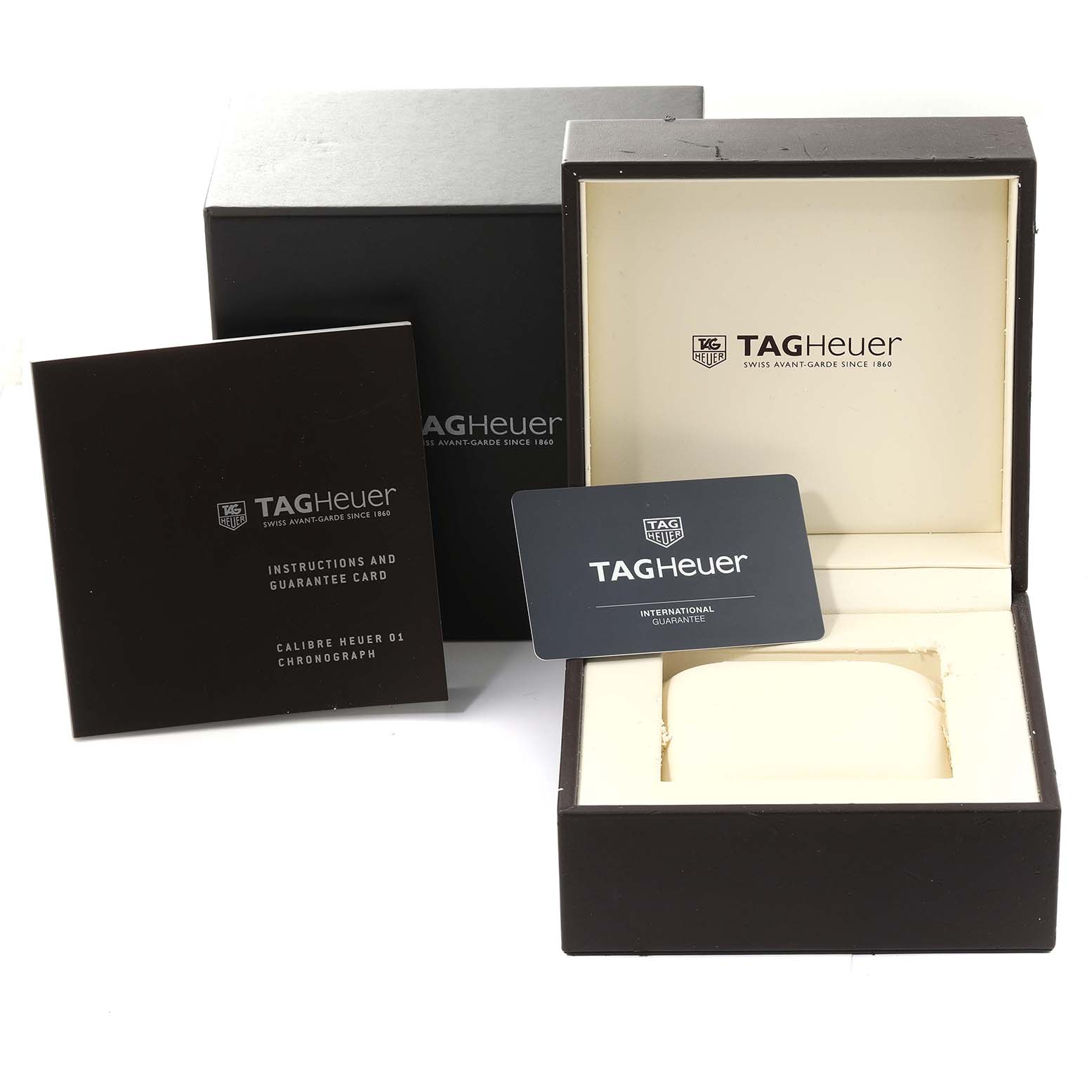 The image shows the empty box, instructions booklet, and guarantee card for the Tag Heuer Carrera CAR201Z.FT6046 Men's Stainless Steel Black Dial CAR201Z.FT6046 Men's Stainless Steel Black Dial watch.