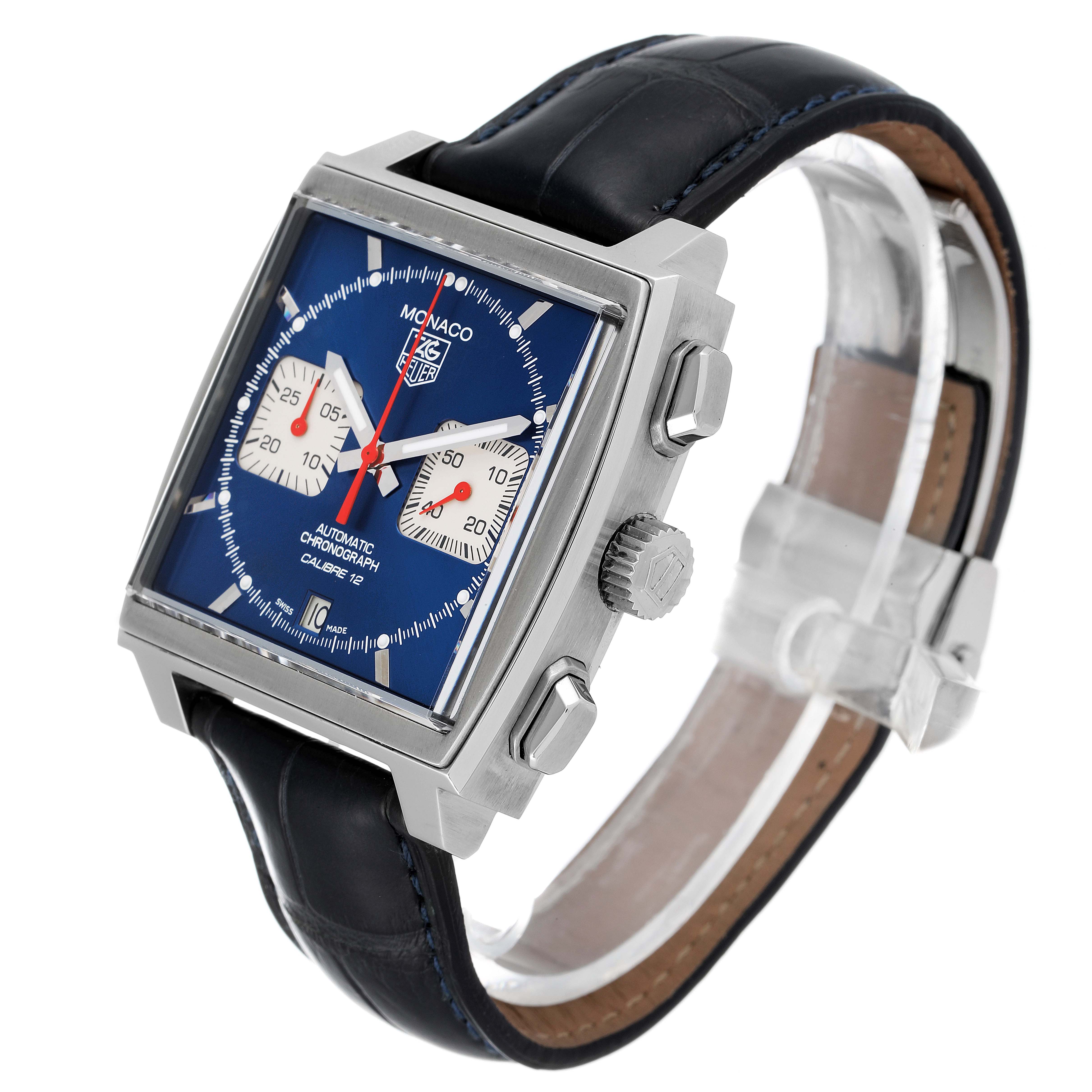 The image shows a side angle of a Tag Heuer Monaco CAW2111 Men
s Stainless Steel Blue Dial CAW2111 Men
s Stainless Steel Blue Dial watch highlighting its blue dial, crown, pushers, and black leather strap.