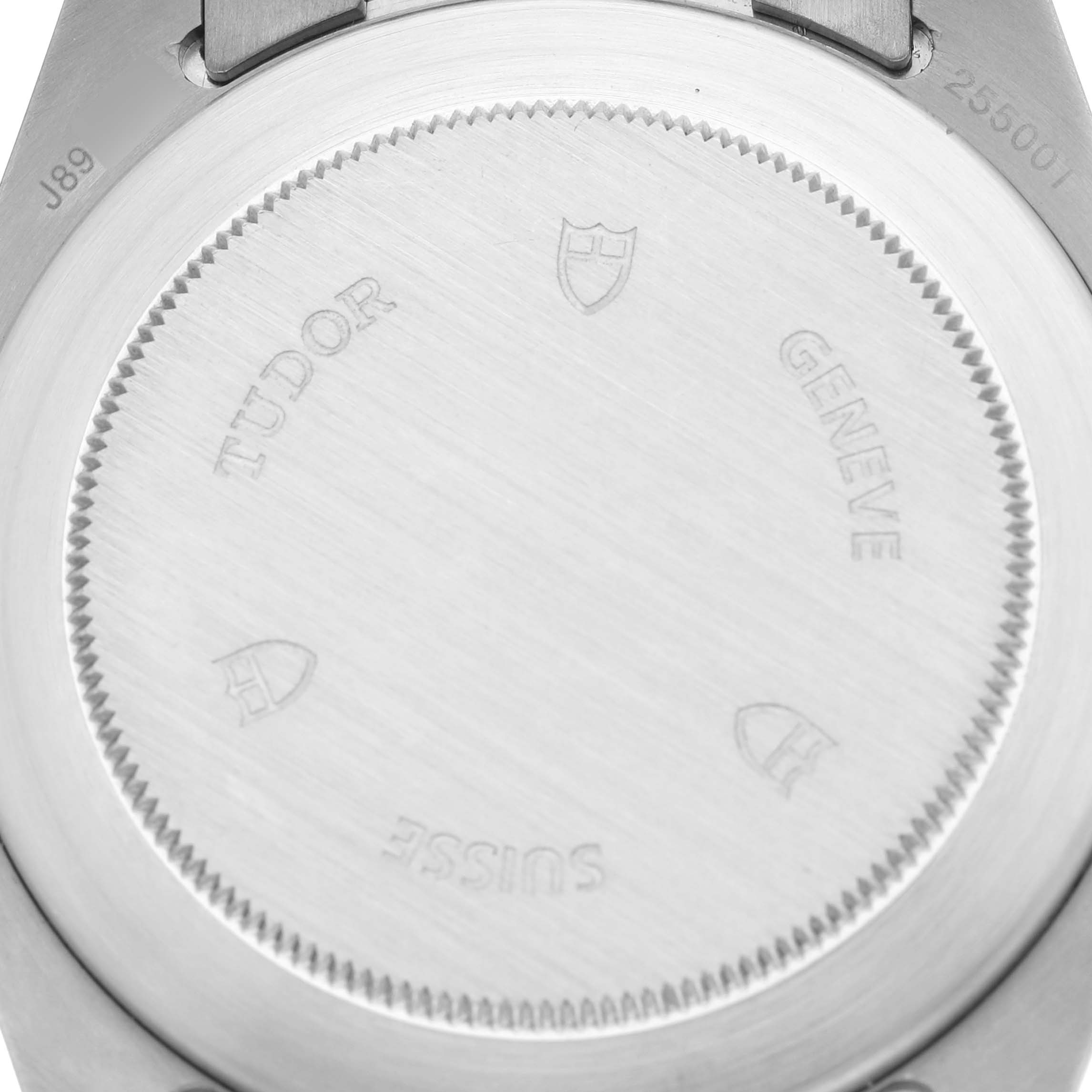 The image shows the case back of a Tudor Pelagos 25500TN Men's Titanium Black Dial 25500TN Men's Titanium Black Dial watch, capturing brand engraving and serial numbers.