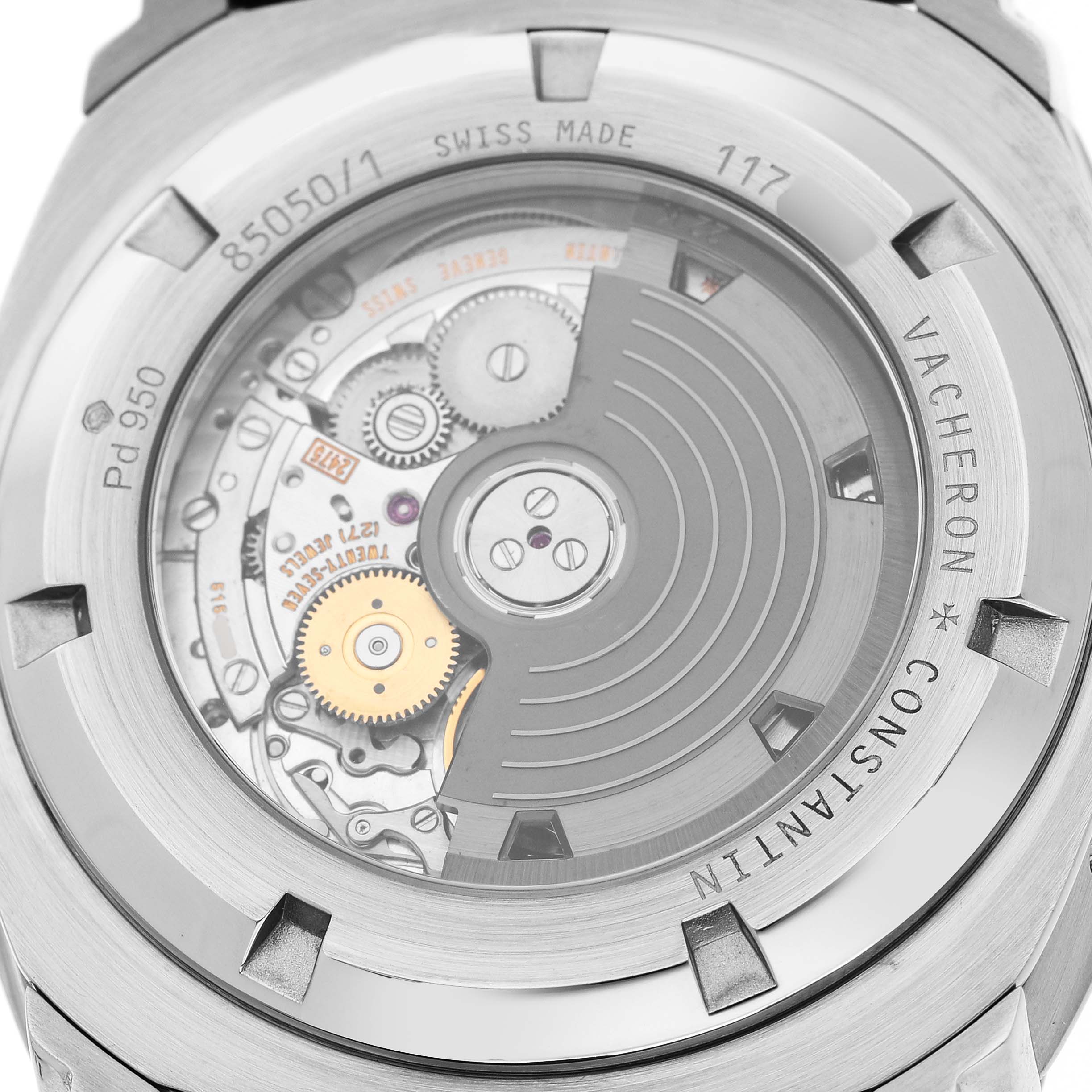 The image shows the back case view of the Vacheron Constantin Quai de L'Île, highlighting its mechanical movement and rotor.