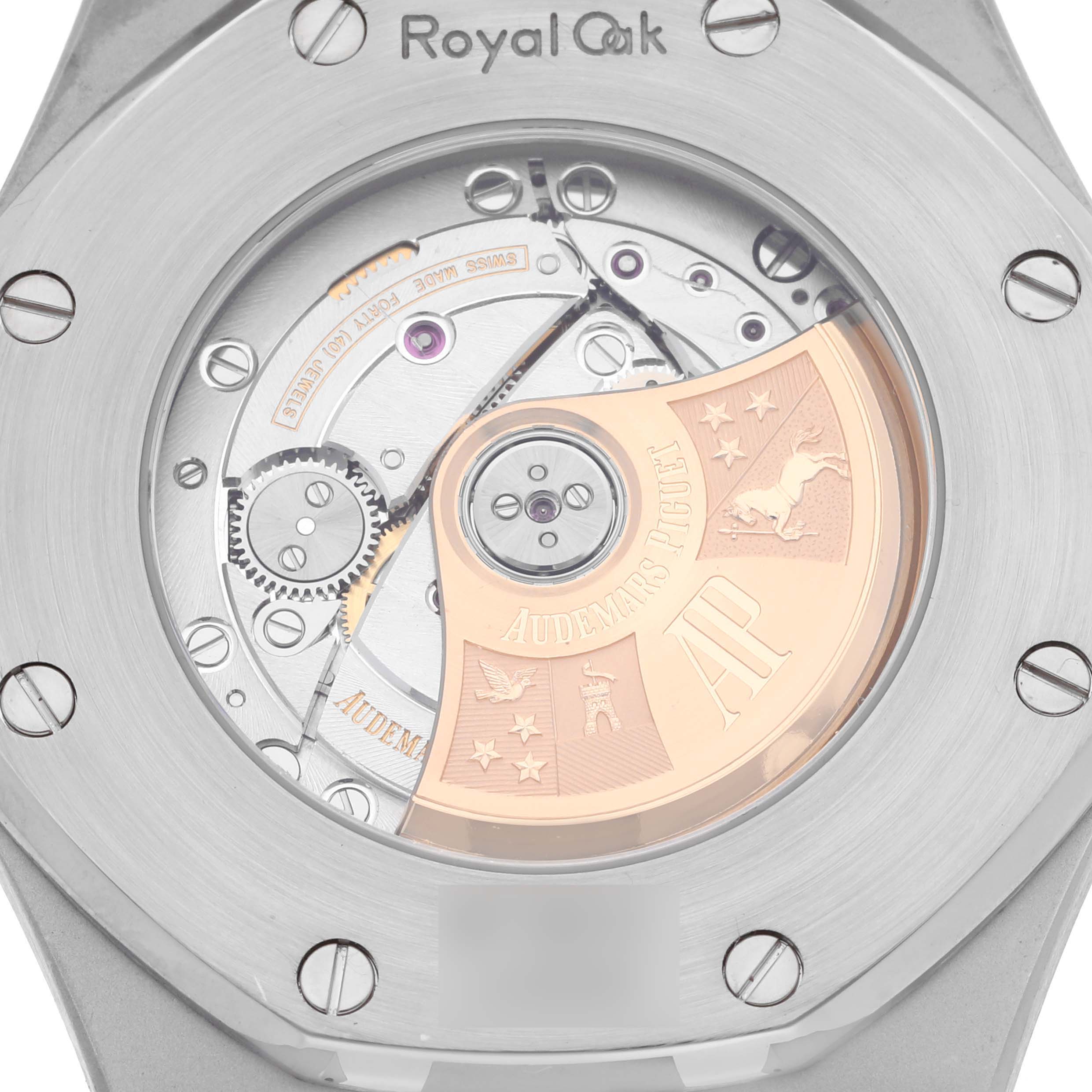 This image shows the back of the Audemars Piguet Royal Oak 15400SR Men's Steel and Gold (two tone) Silver Dial 15400SR Men's Steel and Gold (two tone) Silver Dial watch, revealing its intricate mechanical movement and decorative rotor.