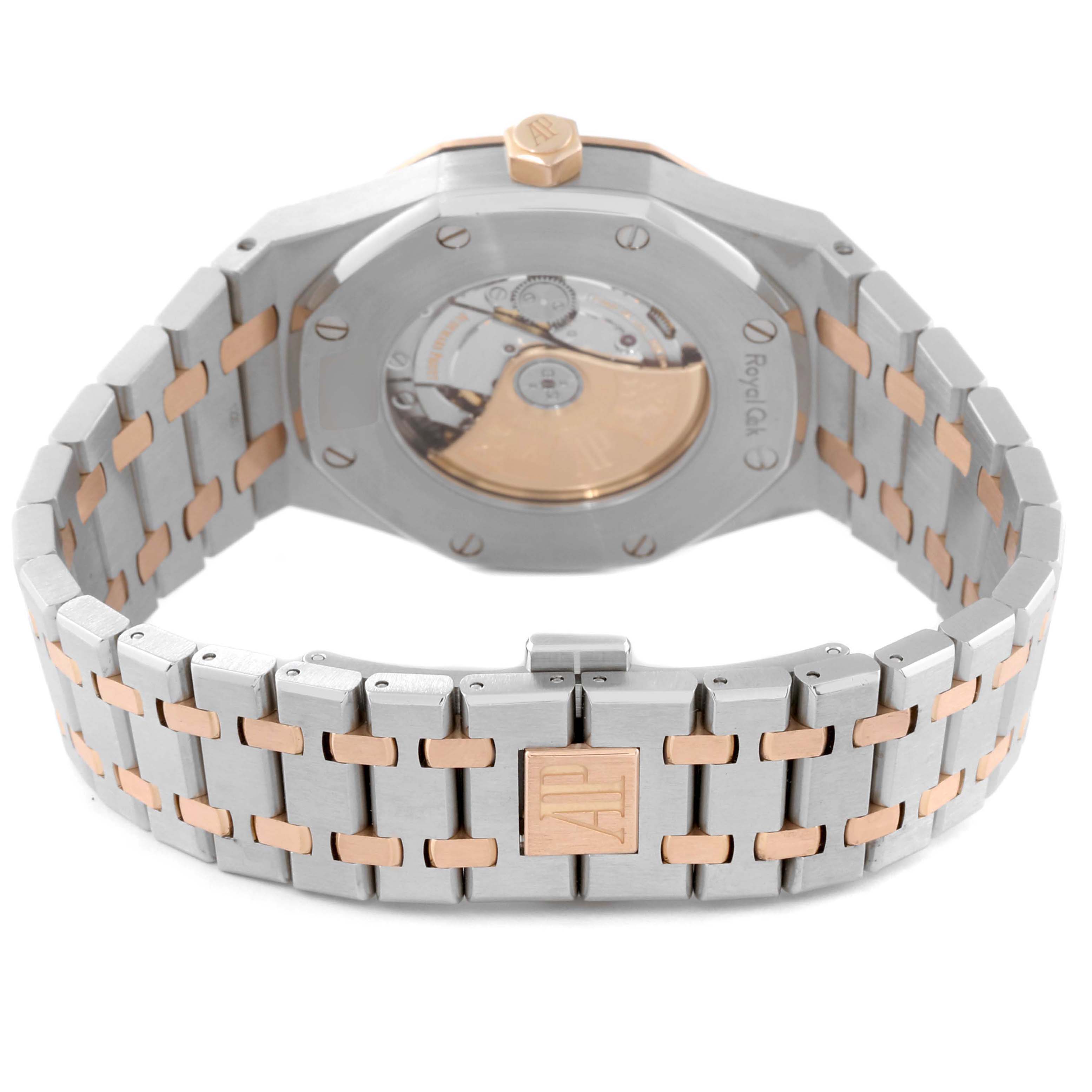 The image shows the back of the Audemars Piguet Royal Oak 15400SR Men's Steel and Gold (two tone) Silver Dial, highlighting its bracelet and open case back.