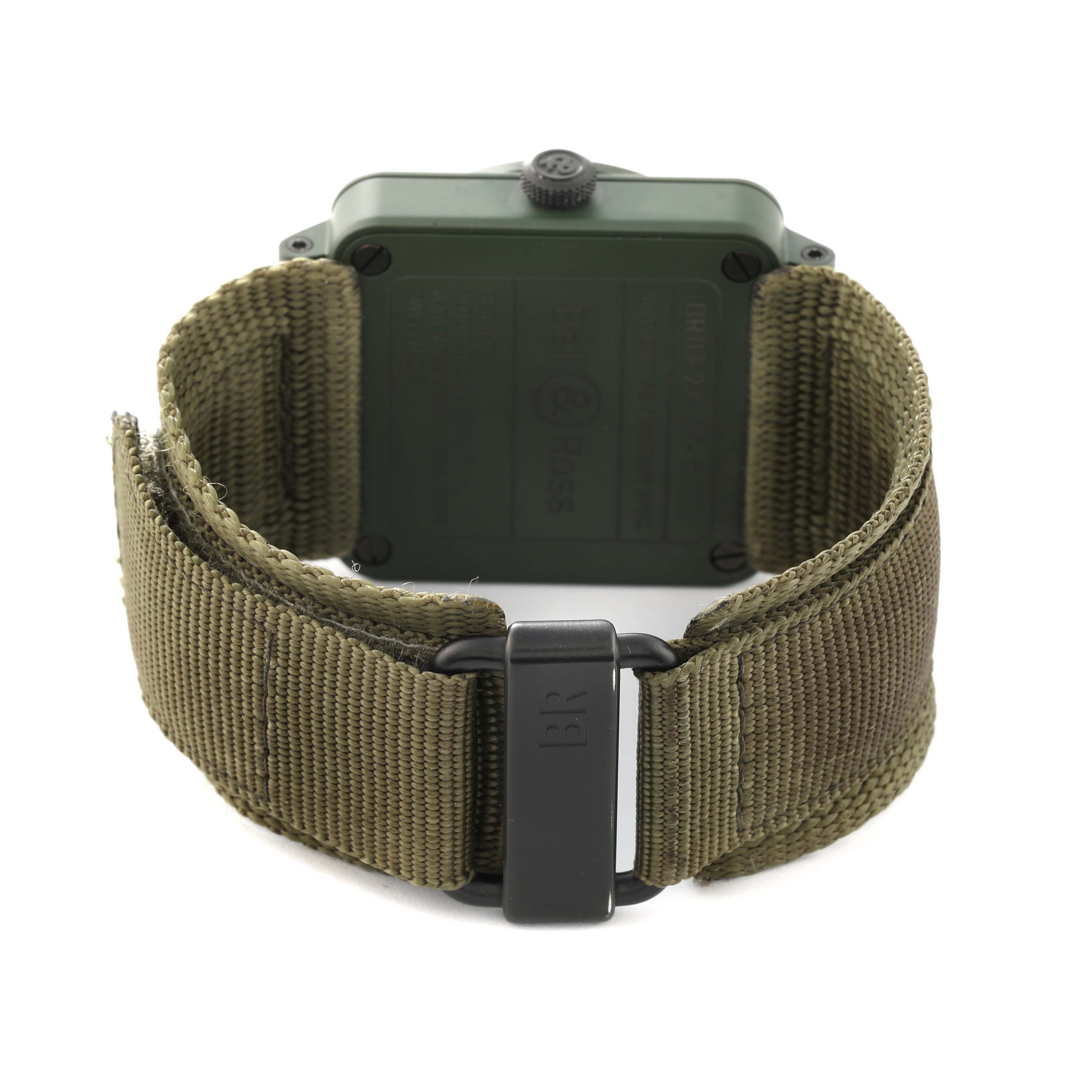 The image shows the back of the Bell 
Ross Instruments BR03-92-CK Men
s Ceramic Black Dial BR03-92-CK Men
s Ceramic Black Dial watch model, highlighting its case back and strap.