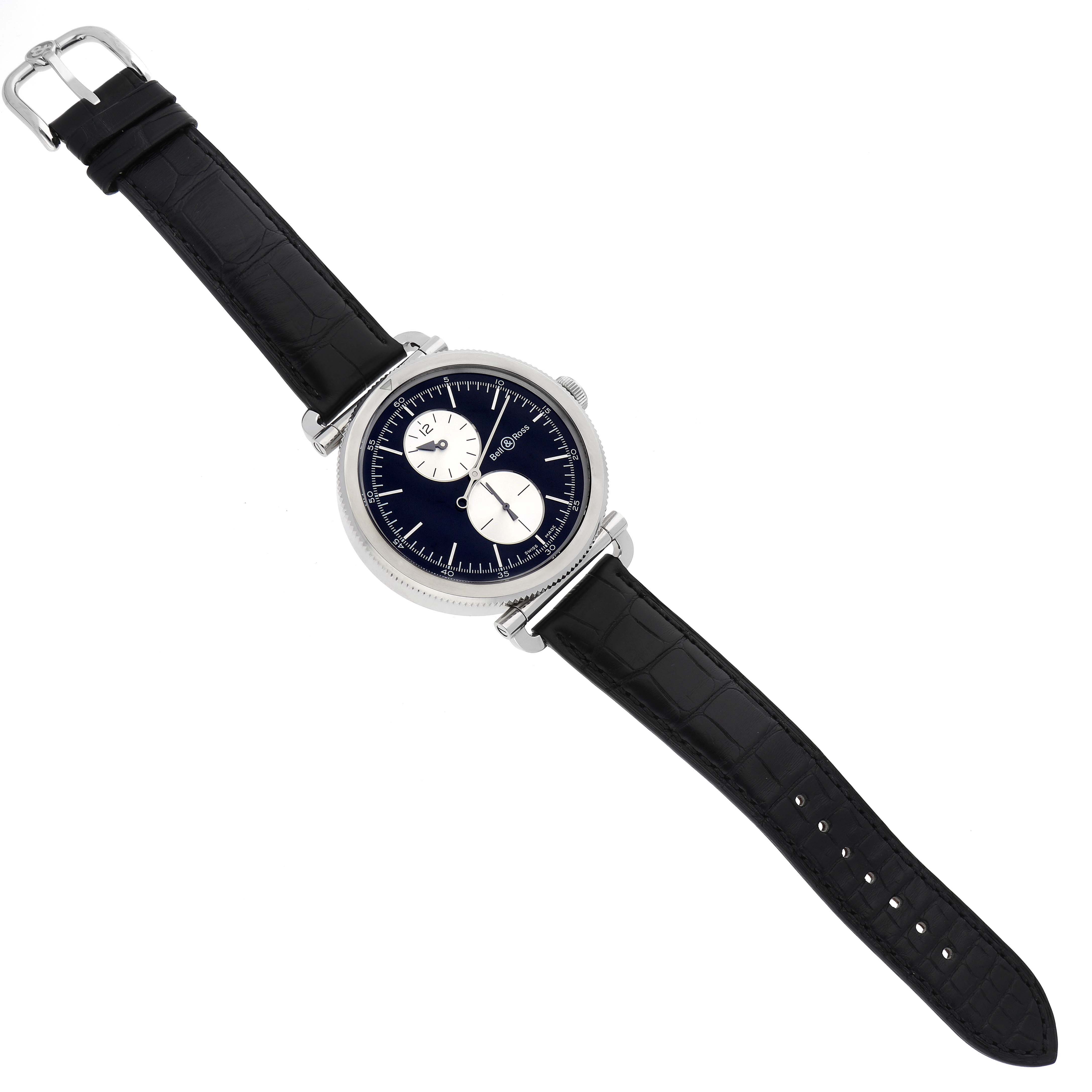 The Bell & Ross Heritage BRV294-BC-BR/SCA Men's Stainless Steel Black Dial BRV294-BC-BR/SCA Men's Stainless Steel Black Dial model watch is shown from a top-down angle, displaying the black strap, silver case, and black dial with two subdials.