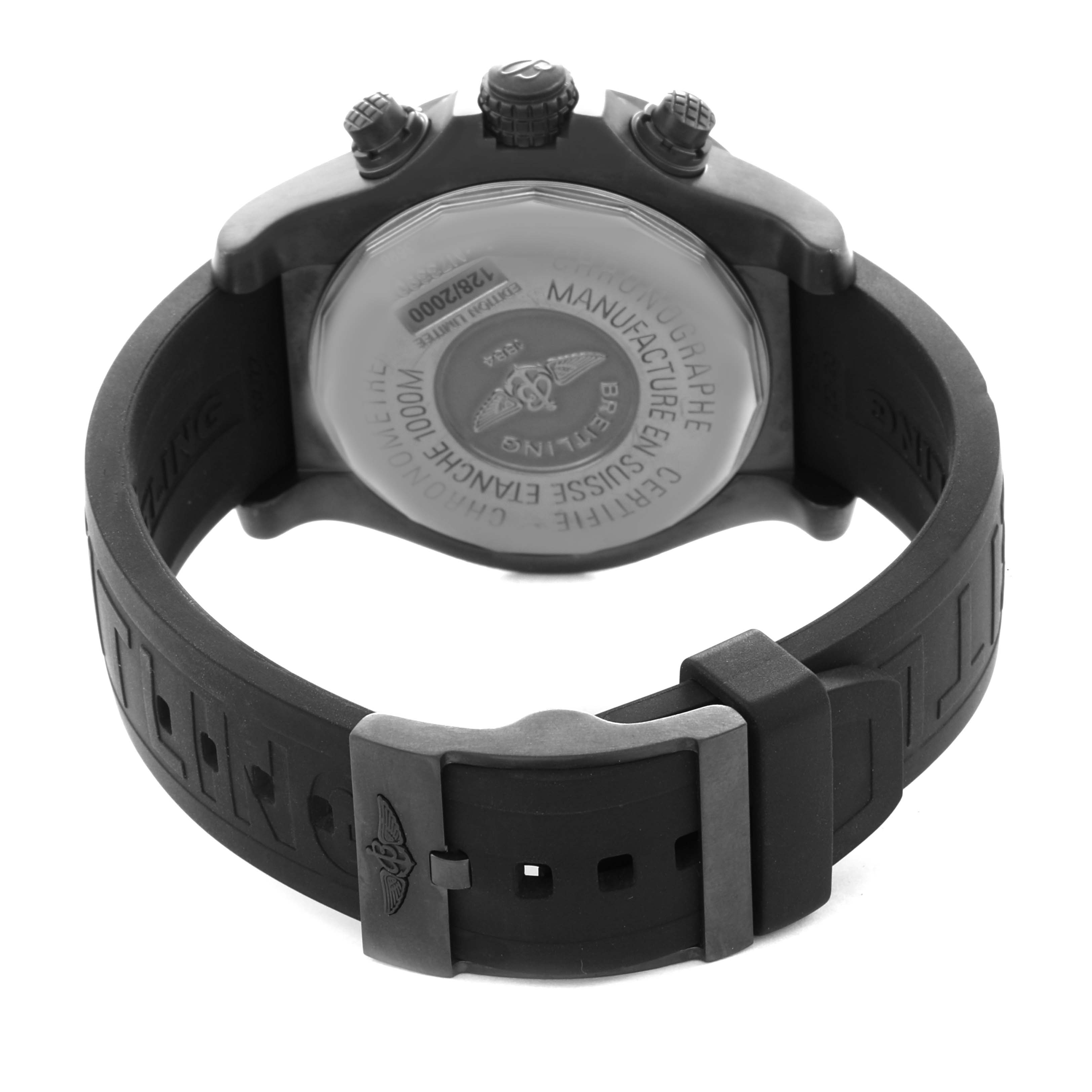 The Breitling Avenger M73390 men
s watch is shown from the back, highlighting the case back, pushers, and black strap with a buckle.