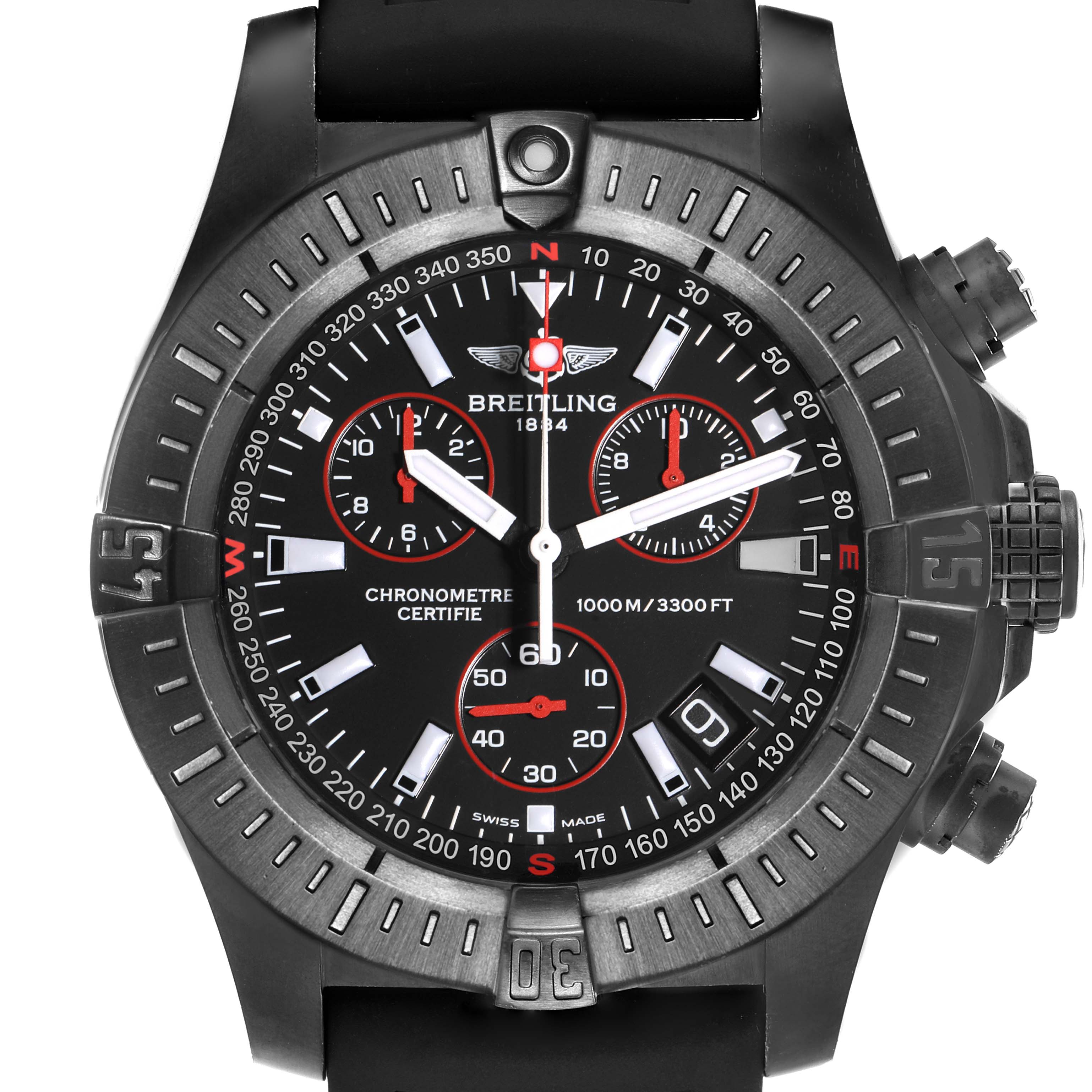 The Breitling Avenger model M73390 is shown from a front angle, highlighting its black dial, chronograph subdials, and rotating bezel.