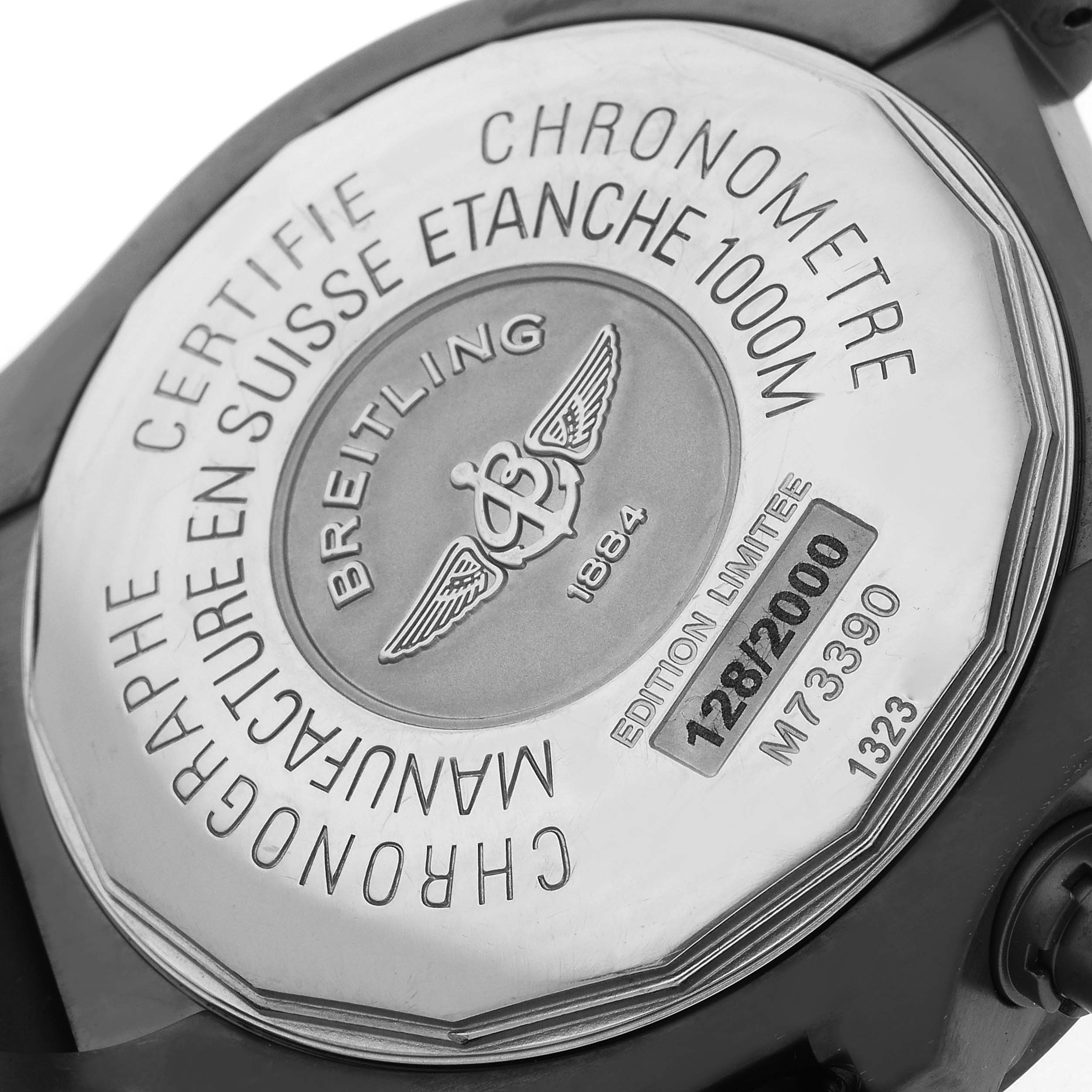 The image shows the back case of a Breitling Avenger watch, model number M73390, highlighting the limited edition number and water resistance details.