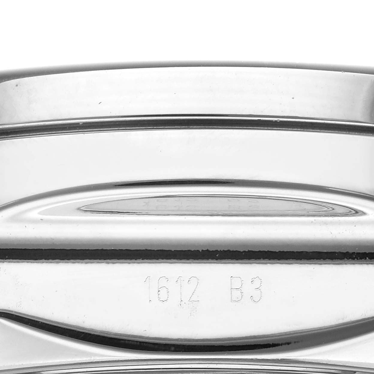 This is a close-up shot of the side and back of a Bentley model by Breitling, showing the engraved details.