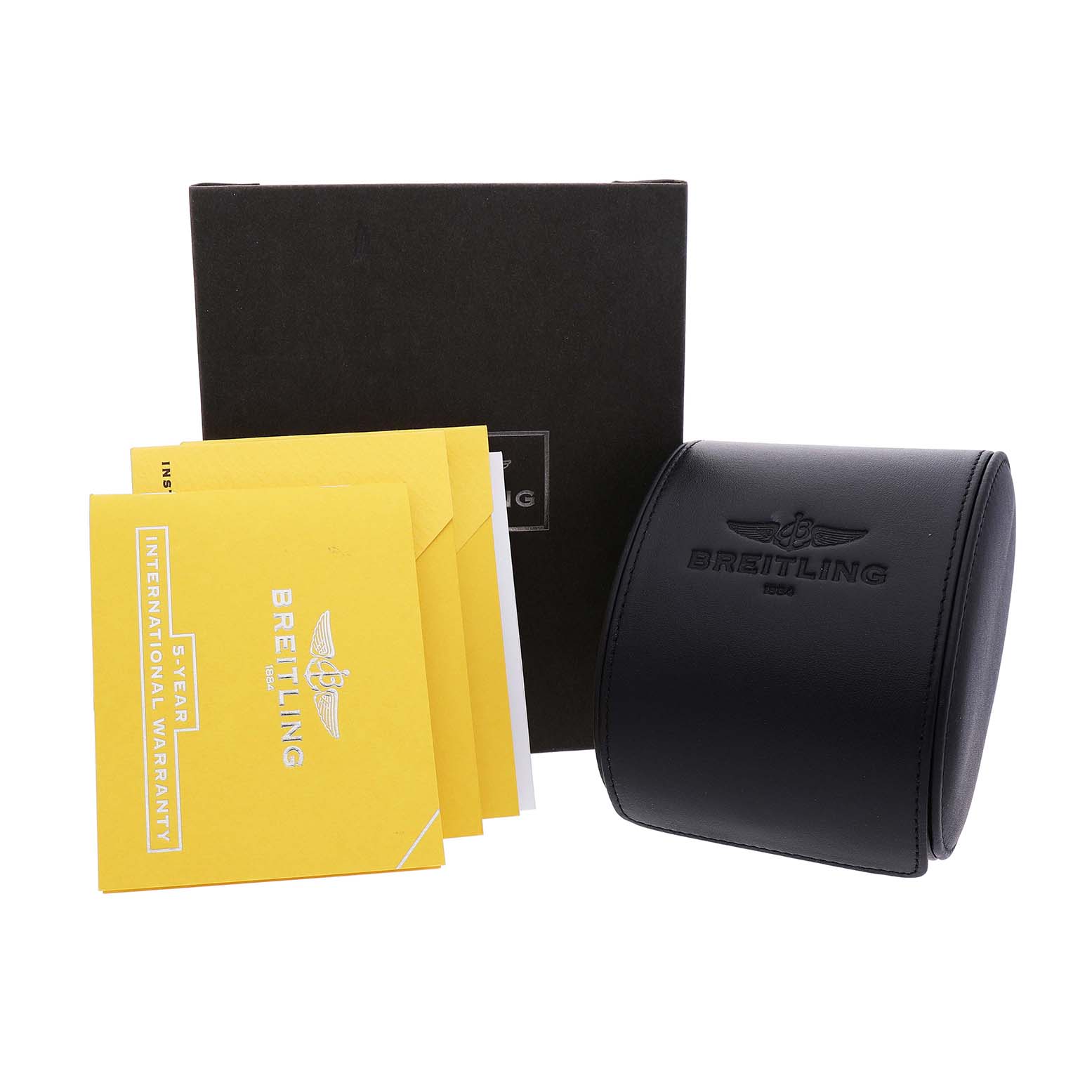 The image shows a Breitling Navitimer AB0120 Men's Stainless Steel Black Dial watch packaging including a black leather case, outer box, and warranty booklets.